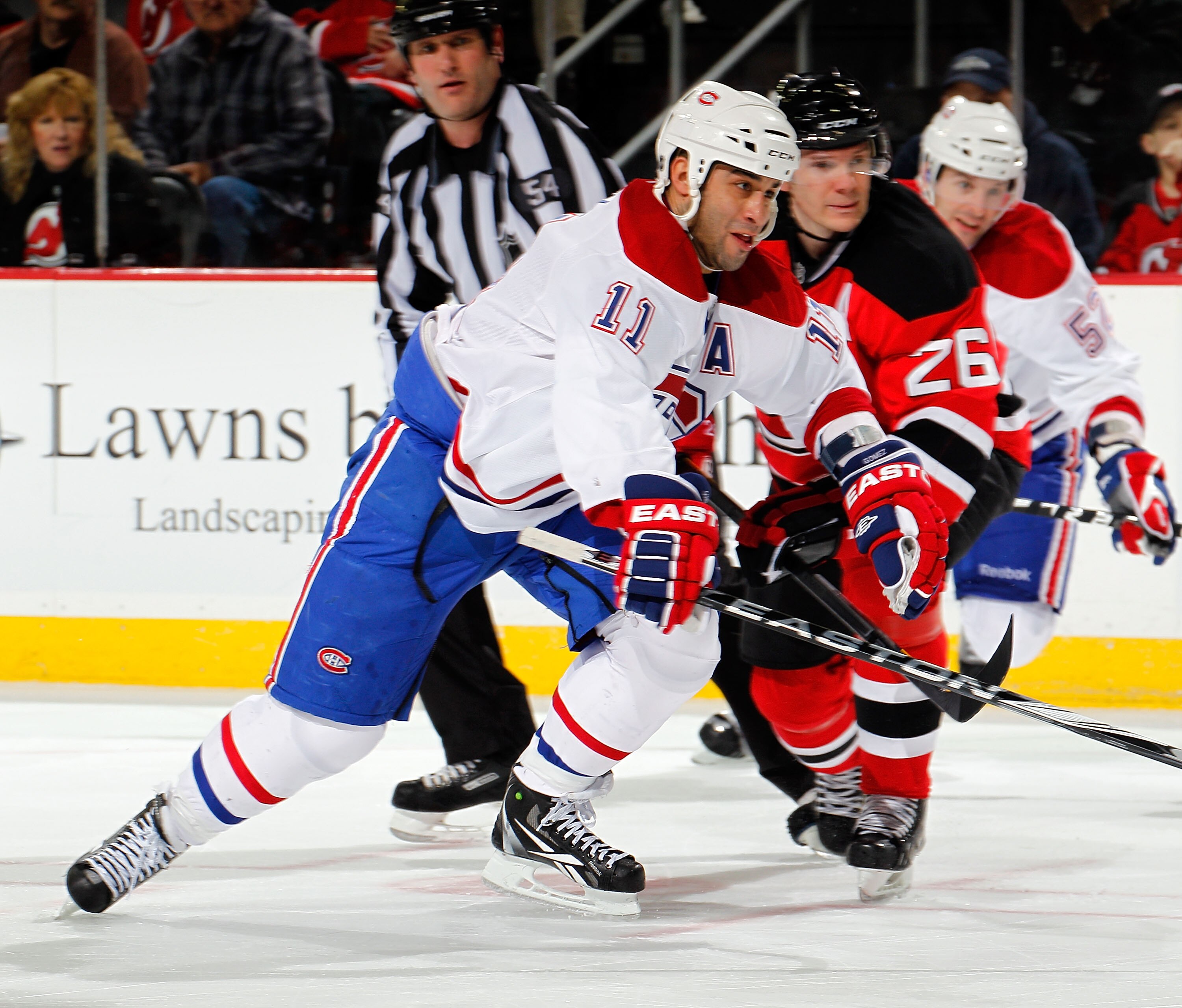NEWARK, NJ - APRIL 02: Scott Gomez #11 of the Montreal Canadians skates during an NHL hockey game against the New Jersey Devils at the Prudential Center on April 2, 2011 in Newark, New Jersey. (Photo by Paul Bereswill/Getty Images) NEWARK, NJ - APRIL 02: Scott Gomez #11 of the Montreal Canadians skates during an NHL hockey game against the New Jersey Devils at the Prudential Center on April 2, 2011 in Newark, New Jersey. (Photo by Paul Bereswill/Getty Images)