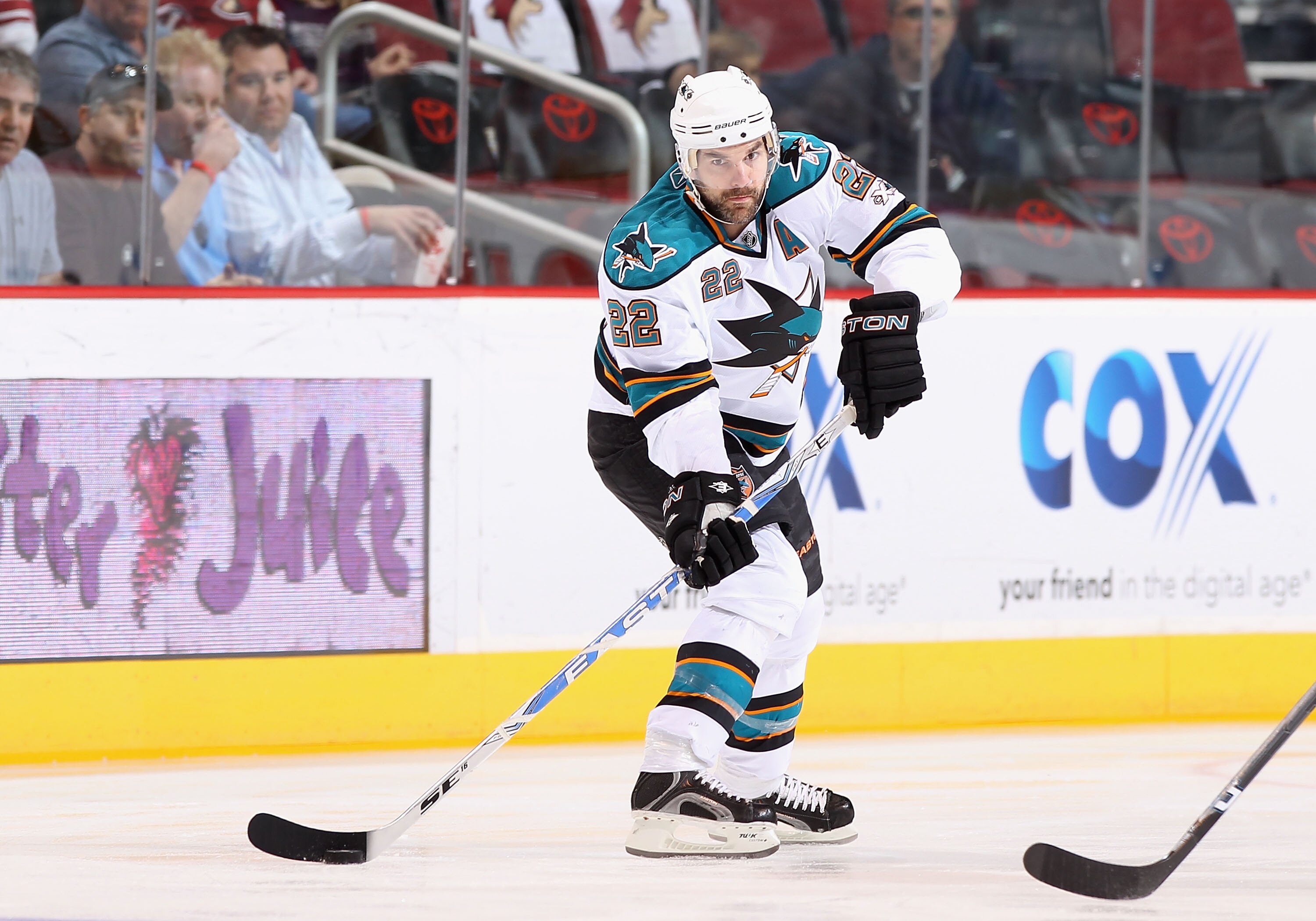 GLENDALE, AZ - MARCH 26: Dan Boyle #22 of the San Jose Sharks skates with the puck during the NHL game against the Phoenix Coyotes at Jobing.com Arena on March 26, 2011 in Glendale, Arizona. The Sharks defeated the Coyotes 4-1. (Photo by Christian Peter GLENDALE, AZ - MARCH 26: Dan Boyle #22 of the San Jose Sharks skates with the puck during the NHL game against the Phoenix Coyotes at Jobing.com Arena on March 26, 2011 in Glendale, Arizona. The Sharks defeated the Coyotes 4-1. (Photo by Christian Peter