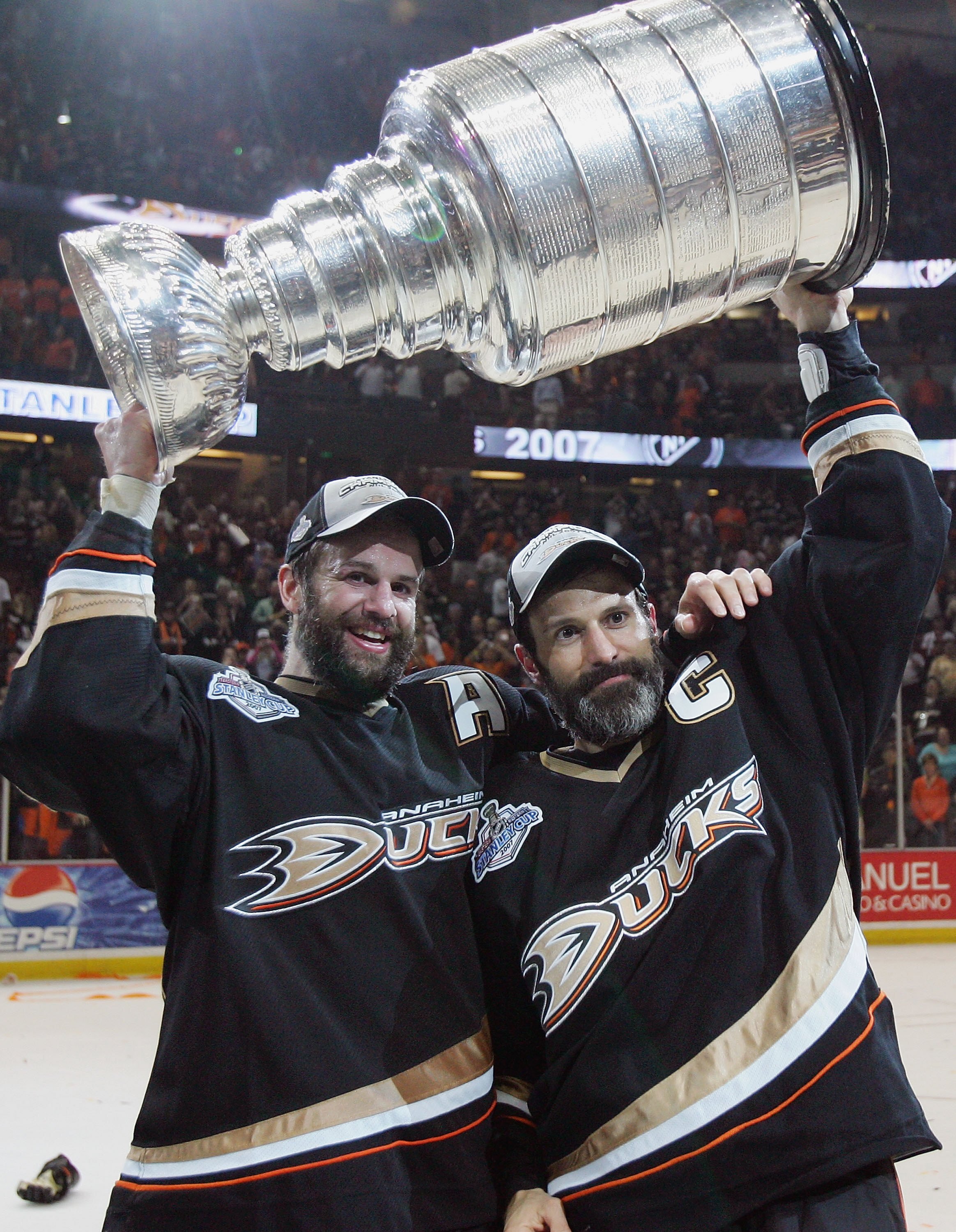 ANAHEIM, CA - JUNE 06: Rob Niedermayer #44 of the Anaheim Ducks and brother Scott Niedermayer #27 hoist the Stanley Cup after their team's victory over the Ottawa Senators in Game Five of the Stanley Cup Finals on June 6, 2007 at Honda Center in Anaheim,