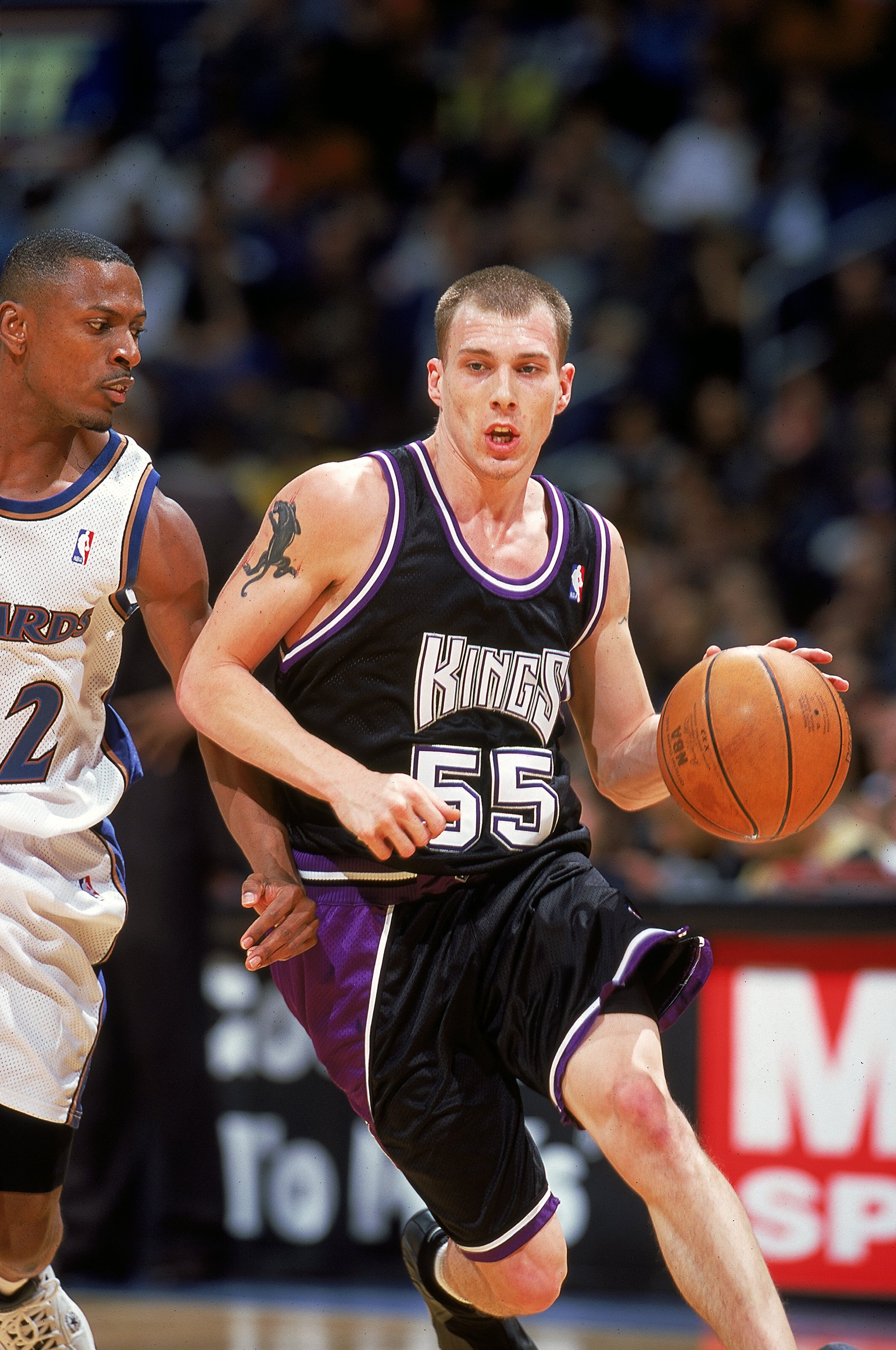 4 Dec 1999:  Jason Williams #55 of the Sacramento Kings dribbling the ball down the court during the game against the Washington Wizards at the MCI Center in Washington, D.C. The Kings defeated the Wizards 114-104.   Mandatory Credit: Doug Pensinger  /All