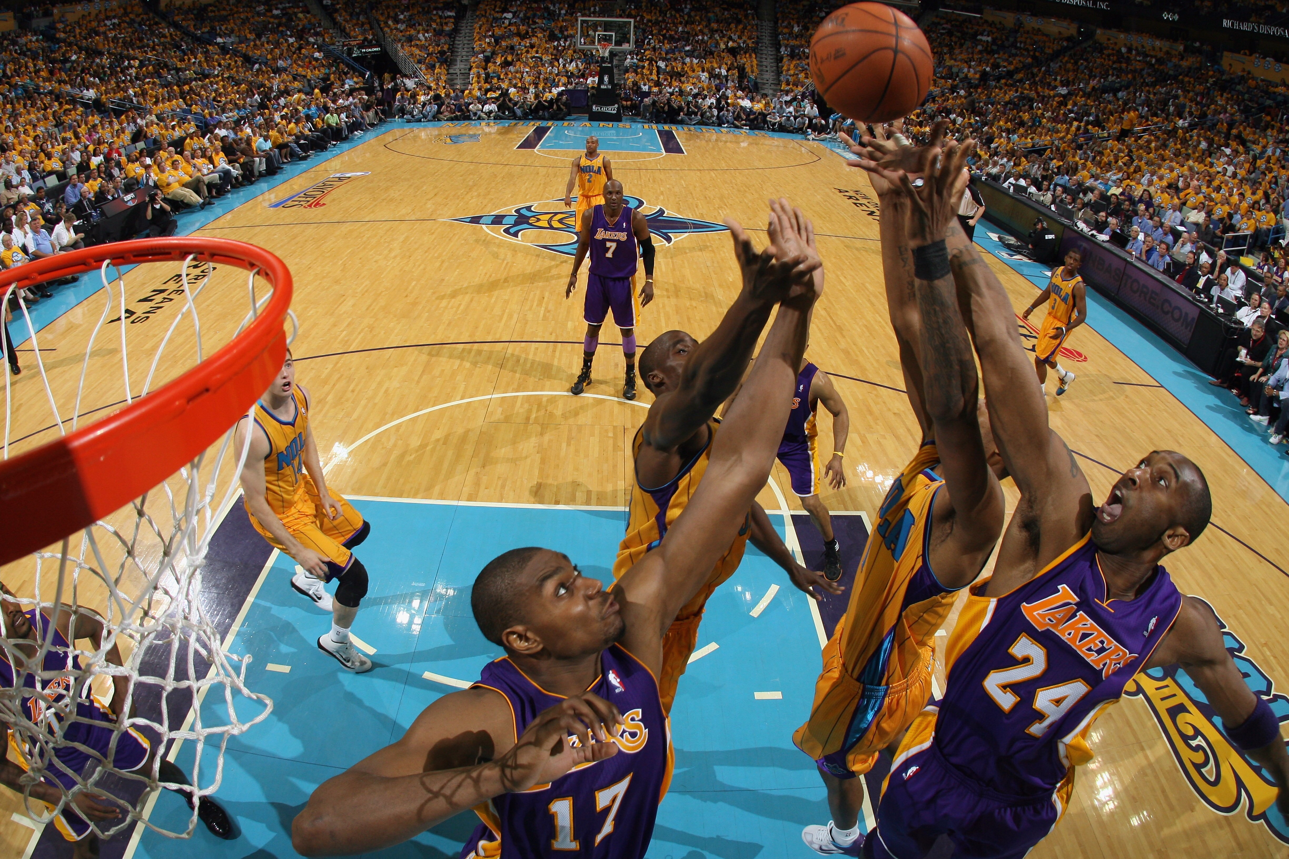NEW ORLEANS, LA - APRIL 22:  Kobe Bryant #24 of the Los Angeles Lakers fights for a rebound with Trevor Ariza #1 of the New Orleans Hornets in Game Three of the Western Conference Quarterfinals in the 2011 NBA Playoffs at the New Orleans Arena  on April 2