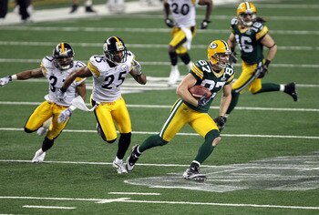 ARLINGTON, TX - FEBRUARY 06:  Jordy Nelson #87 of the Green Bay Packers runs for yards after the catch against Ryan Clark #25 of the Pittsburgh Steelers during Super Bowl XLV at Cowboys Stadium on February 6, 2011 in Arlington, Texas.  (Photo by Mike Ehrm