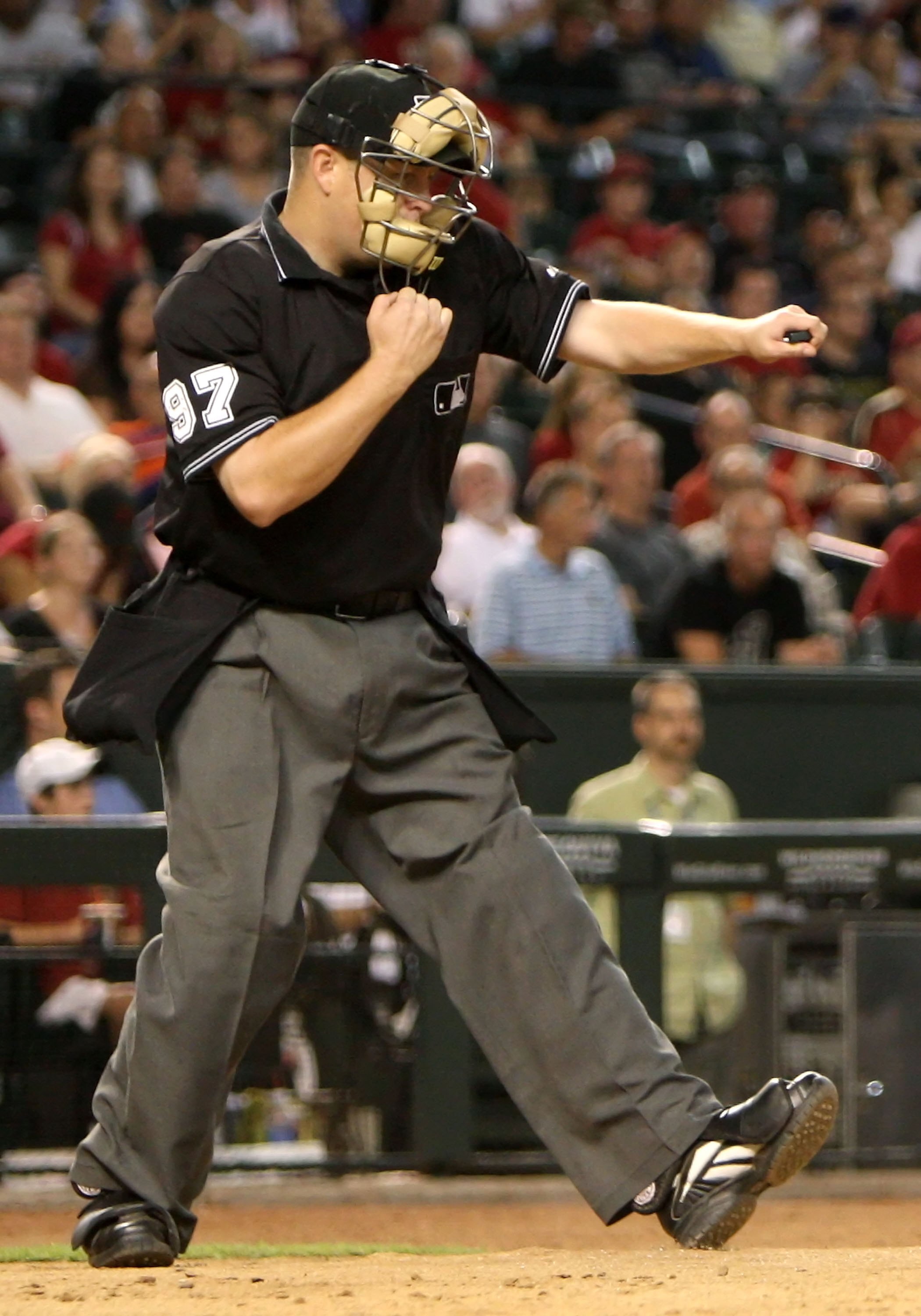 PHOENIX - JULY 23:  Home plate umpire Todd Tichenor calls strike three during the major league baseball game between the Pittsburgh Pirates and the Arizona Diamondbacks at Chase Field on July 23, 2009 in Phoenix, Arizona.  The Diamondbacks defeated the Pi