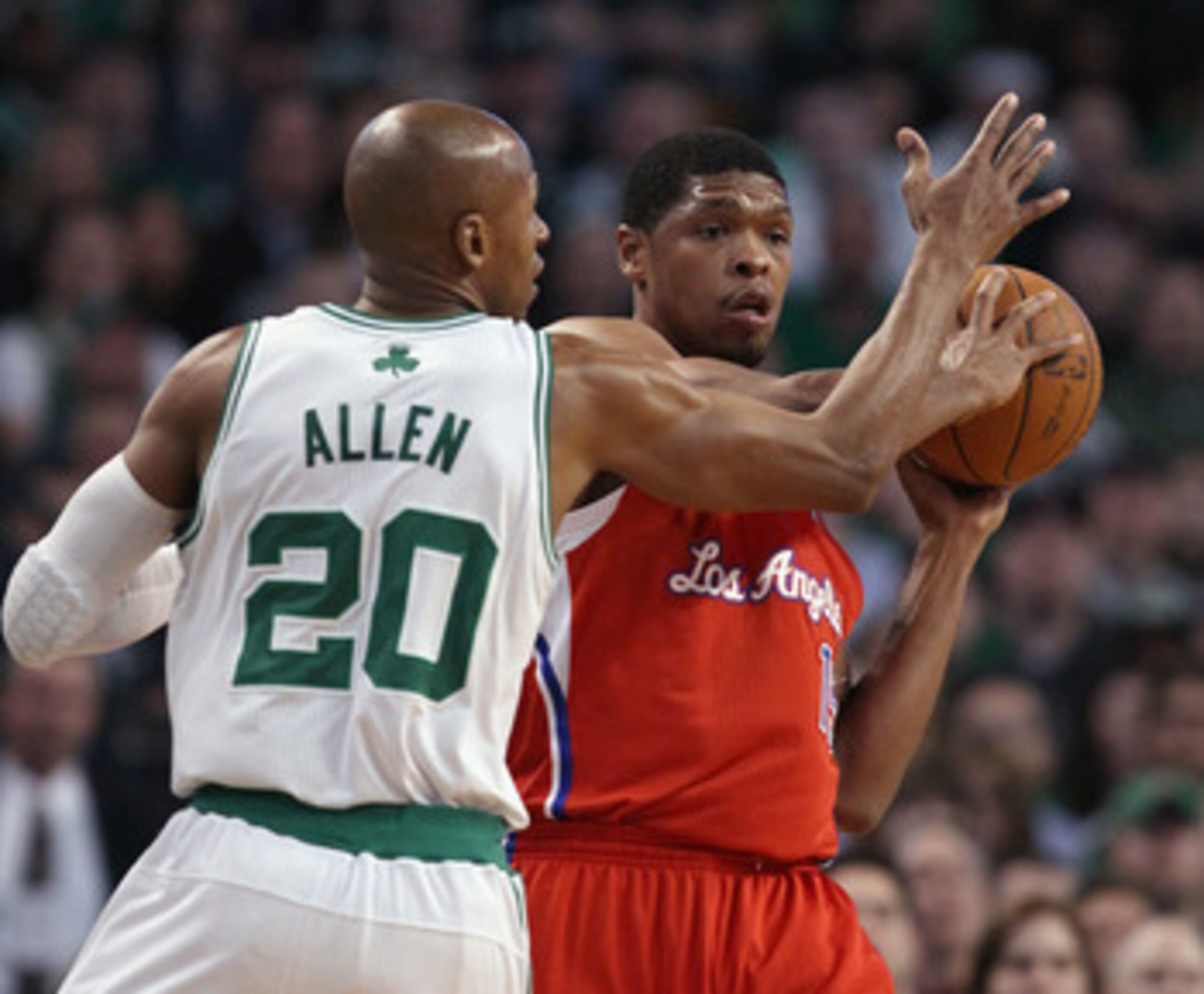 BOSTON, MA - MARCH 09: Ryan Gomes #15 of the Los Angeles Clippers looks to pass as Ray Allen #20 of the Boston Celtics defends on March 9, 2011 at the TD Garden in Boston, Massachusetts. NOTE TO USER: User expressly acknowledges and agrees that, by downlo