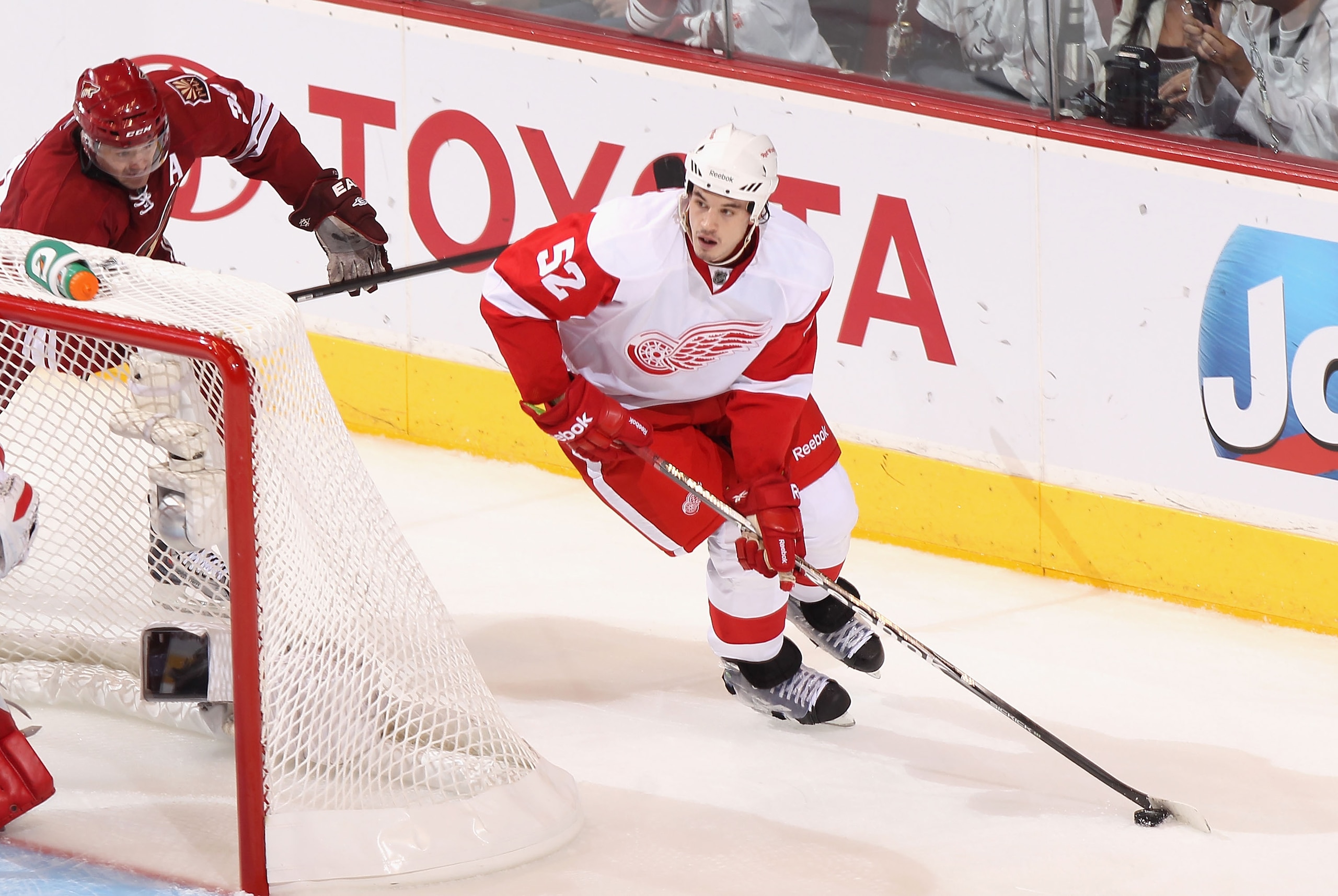 GLENDALE, AZ - APRIL 18:  Jonathan Ericsson #52 of the Detroit Red Wings skates with the puck in Game Three of the Western Conference Quarterfinals against the Phoenix Coyotes during the 2011 NHL Stanley Cup Playoffs at Jobing.com Arena on April 18, 2011