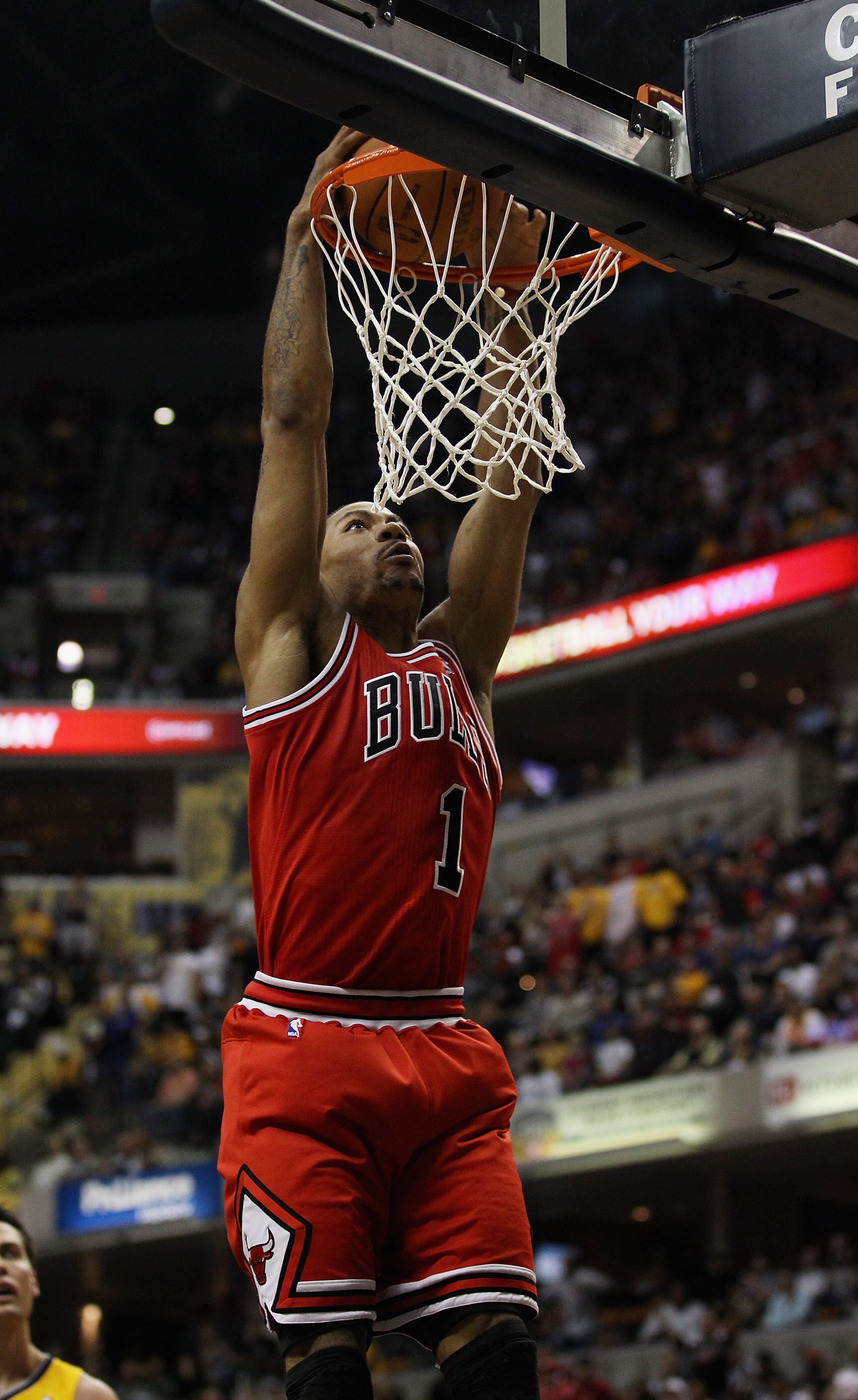 INDIANAPOLIS, IN - APRIL 23: Derrick Rose #1 of the Chicago Bulls goes uo for a dunk against the Indiana Pacers in Game Four of the Eastern Conference Quarterfinals in the 2011 NBA Playoffs at Conseco Fieldhouse on April 23, 2011 in Indianapolis, Indiana.
