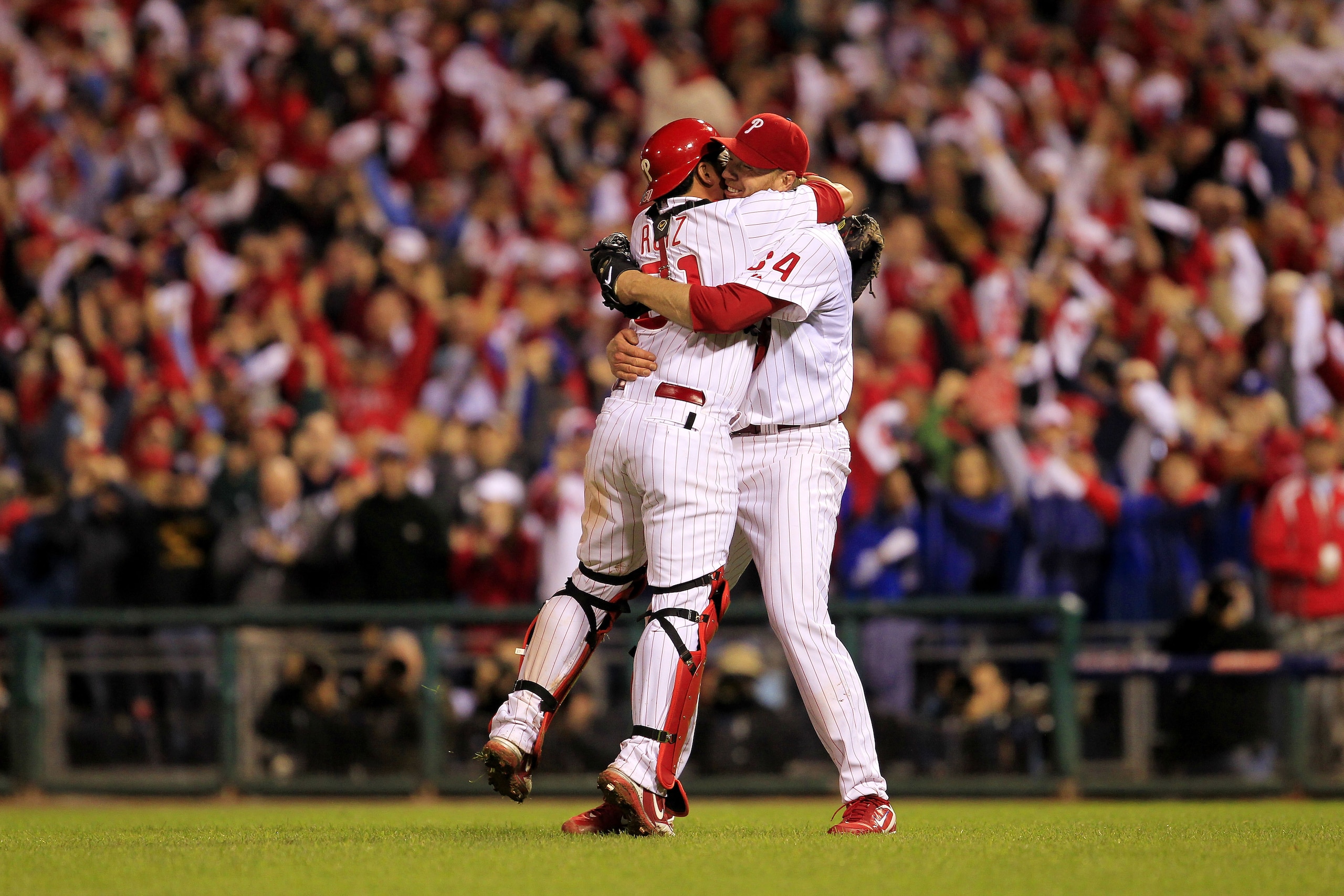 PHILADELPHIA - OCTOBER 06: Roy Halladay #34 and Carlos Ruiz #51 of the Philadelphia Phillies celebrate Halladay's no-hitter and the win in Game 1 of the NLDS against the Cincinnati Reds at Citizens Bank Park on October 6, 2010 in Philadelphia, Pennsylvan PHILADELPHIA - OCTOBER 06: Roy Halladay #34 and Carlos Ruiz #51 of the Philadelphia Phillies celebrate Halladay's no-hitter and the win in Game 1 of the NLDS against the Cincinnati Reds at Citizens Bank Park on October 6, 2010 in Philadelphia, Pennsylvan