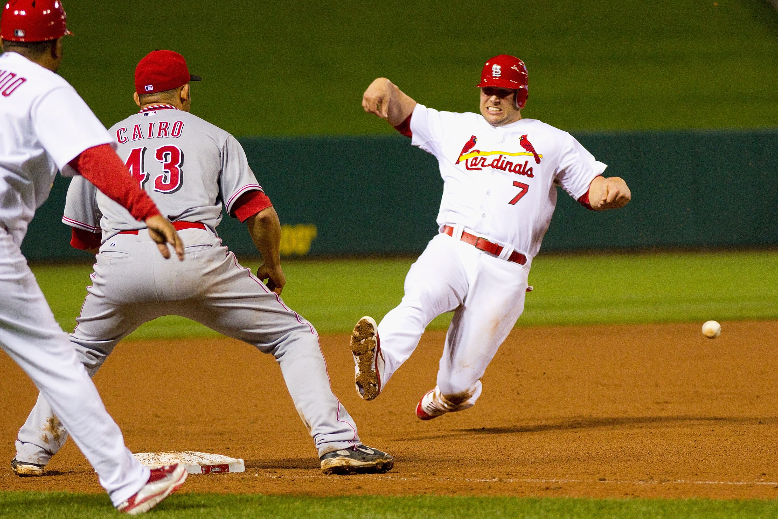 ST. LOUIS, MO - APRIL 22: Matt Holliday #7 of the St. Louis Cardinals is thrown out at third base against the Cincinnati Reds at Busch Stadium on April 22, 2011 in St. Louis, Missouri.  (Photo by Dilip Vishwanat/Getty Images)