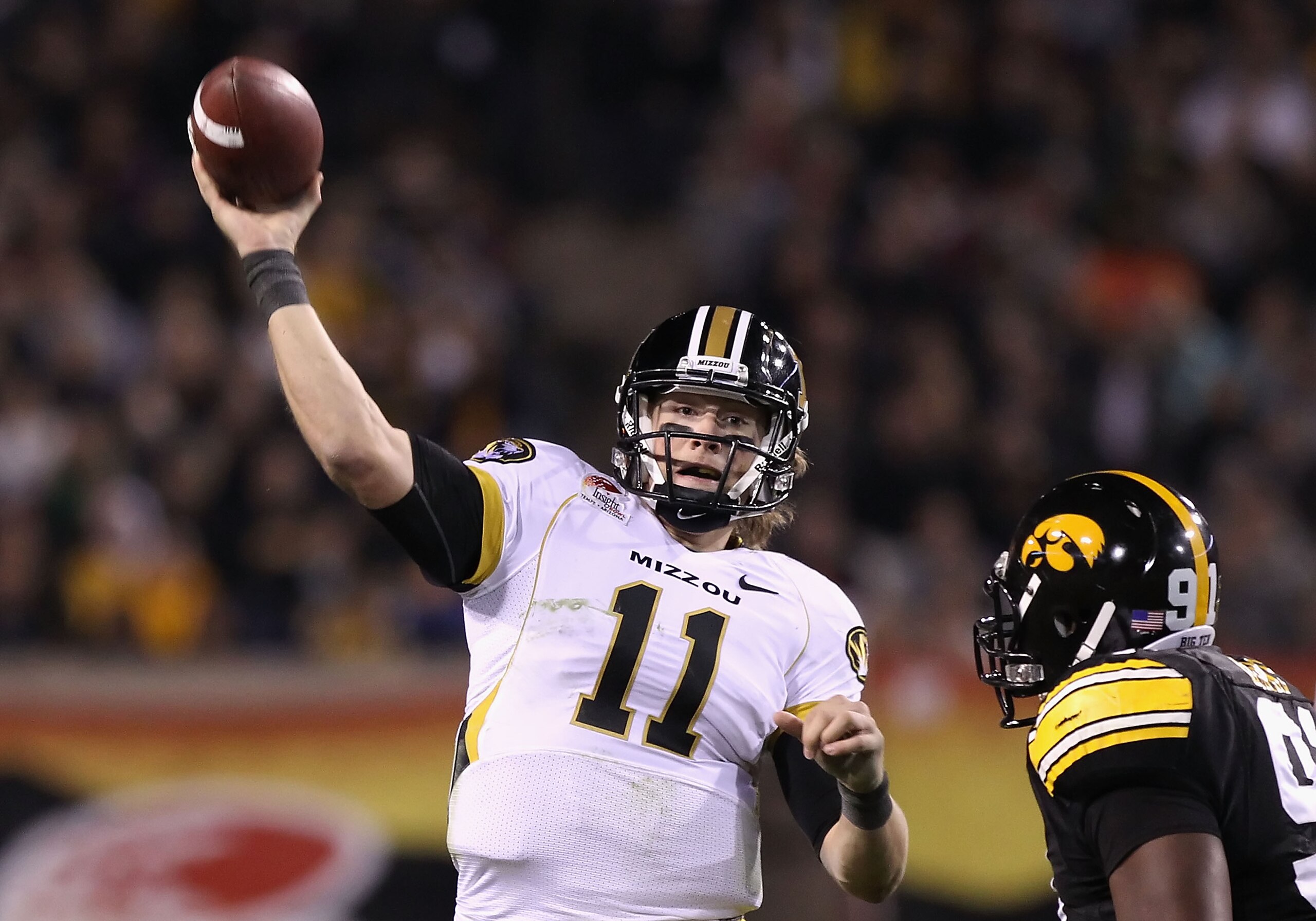 TEMPE, AZ - DECEMBER 28: Quarterback Blaine Gabbert #11 of the Missouri Tigers throws a pass during the Insight Bowl against the Iowa Hawkeyes at Sun Devil Stadium on December 28, 2010 in Tempe, Arizona. The Hawkeyes defeated the Tigers 27-24. (Photo by TEMPE, AZ - DECEMBER 28: Quarterback Blaine Gabbert #11 of the Missouri Tigers throws a pass during the Insight Bowl against the Iowa Hawkeyes at Sun Devil Stadium on December 28, 2010 in Tempe, Arizona. The Hawkeyes defeated the Tigers 27-24. (Photo by
