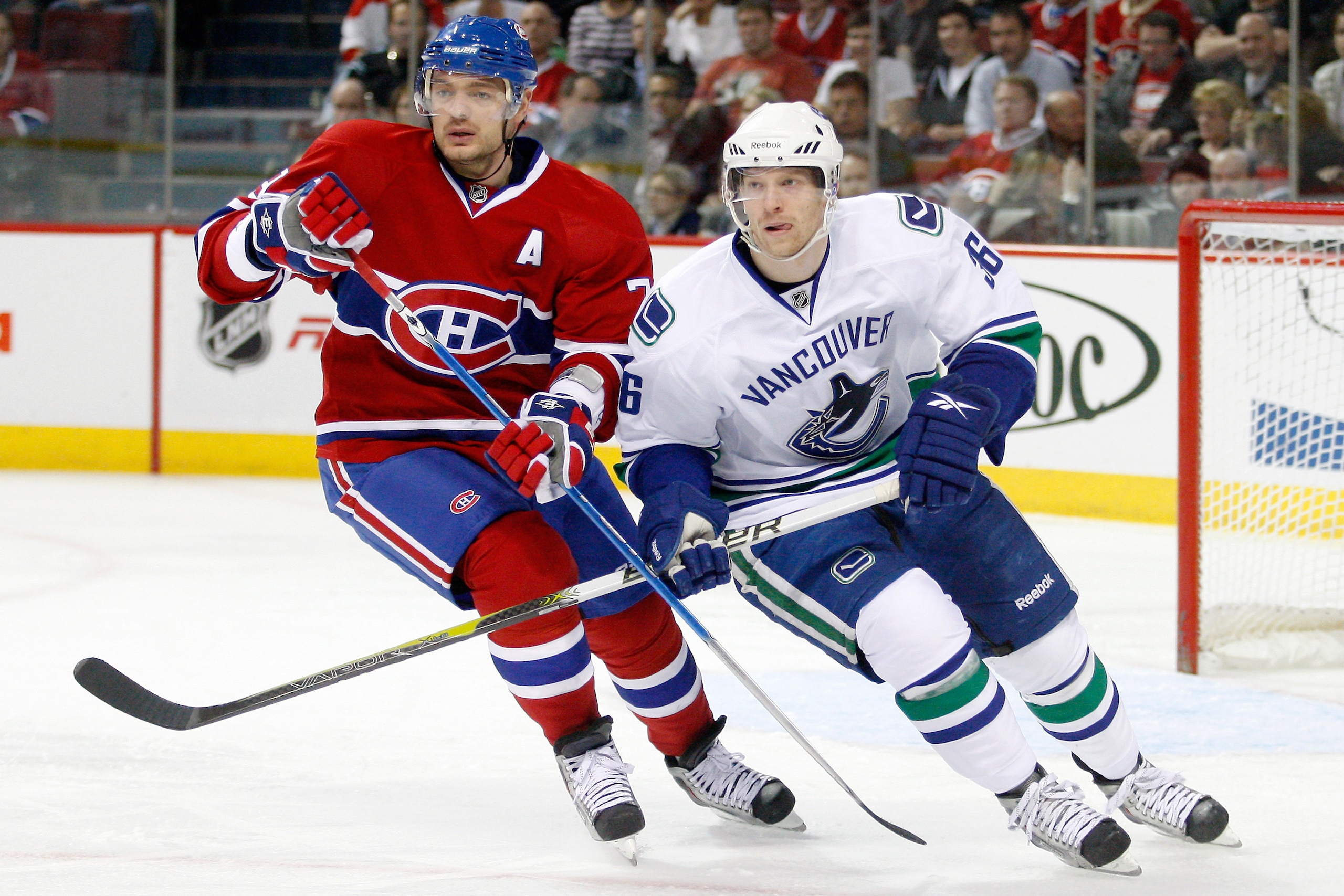 MONTREAL - NOVEMBER 9: Andrei Markov #79 of the Montreal Canadiens defends against Jannik Hansen #36 of the Vancouver Canucks during the NHL game at the Bell Centre on November 9, 2010 in Montreal, Quebec, Canada. (Photo by Richard Wolowicz/Getty Images MONTREAL - NOVEMBER 9: Andrei Markov #79 of the Montreal Canadiens defends against Jannik Hansen #36 of the Vancouver Canucks during the NHL game at the Bell Centre on November 9, 2010 in Montreal, Quebec, Canada. (Photo by Richard Wolowicz/Getty Images