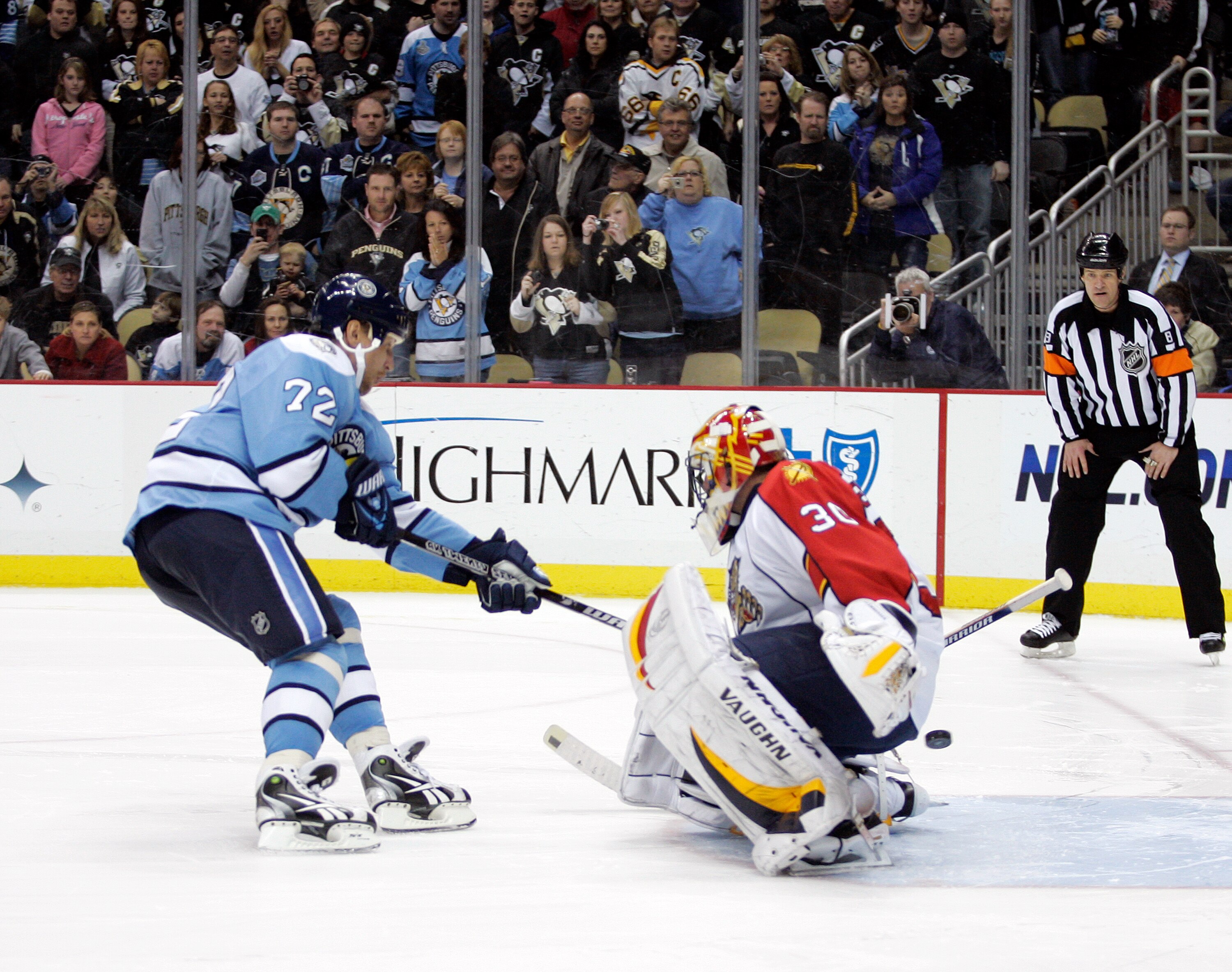 PITTSBURGH, PA - MARCH 27: Alexei Kovalev #72 of the Pittsburgh Penguins scores past Scott Clemmensen #30 of the Florida Panthers during the shootout at Consol Energy Center on March 27, 2011 in Pittsburgh, Pennsylvania. The Penguins defeated the Panthers