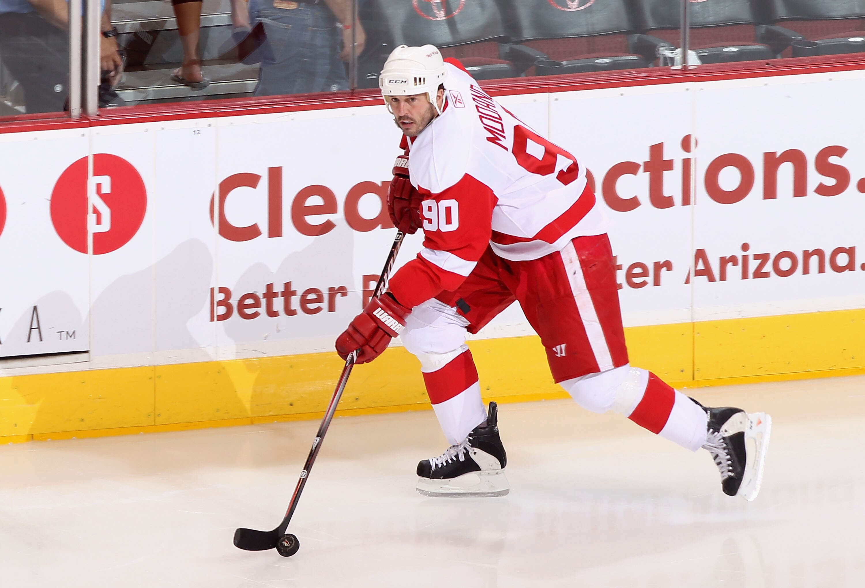 GLENDALE, AZ - APRIL 20:  Mike Modano #90 of the Detroit Red Wings skates with the puck in Game Four of the Western Conference Quarterfinals against the Phoenix Coyotes during the 2011 NHL Stanley Cup Playoffs at Jobing.com Arena on April 20, 2011 in Glen