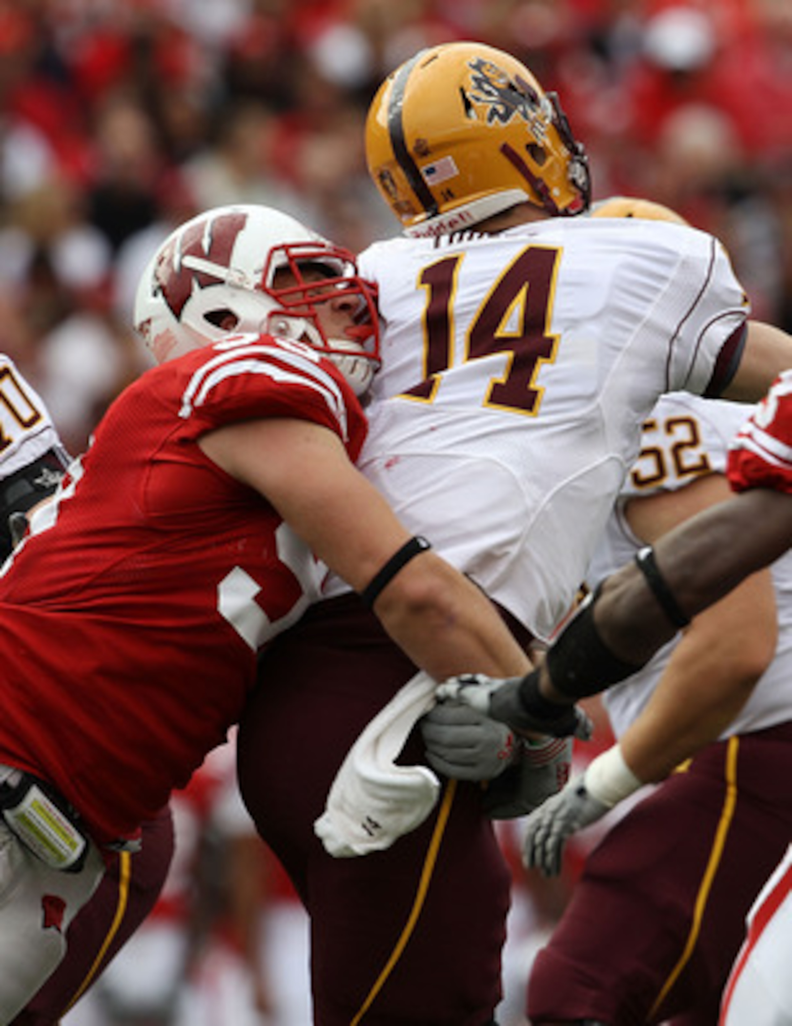 MADISON, WI - SEPTEMBER 18: J.J. Watt #99 of the Wisconsin Badgers hits Steven Threet #14 of the Arizona State Sun Devils at Camp Randall Stadium on September 18, 2010 in Madison, Wisconsin. Wisconsin defeated Arizona State 20-19. (Photo by Jonathan Danie MADISON, WI - SEPTEMBER 18: J.J. Watt #99 of the Wisconsin Badgers hits Steven Threet #14 of the Arizona State Sun Devils at Camp Randall Stadium on September 18, 2010 in Madison, Wisconsin. Wisconsin defeated Arizona State 20-19. (Photo by Jonathan Danie