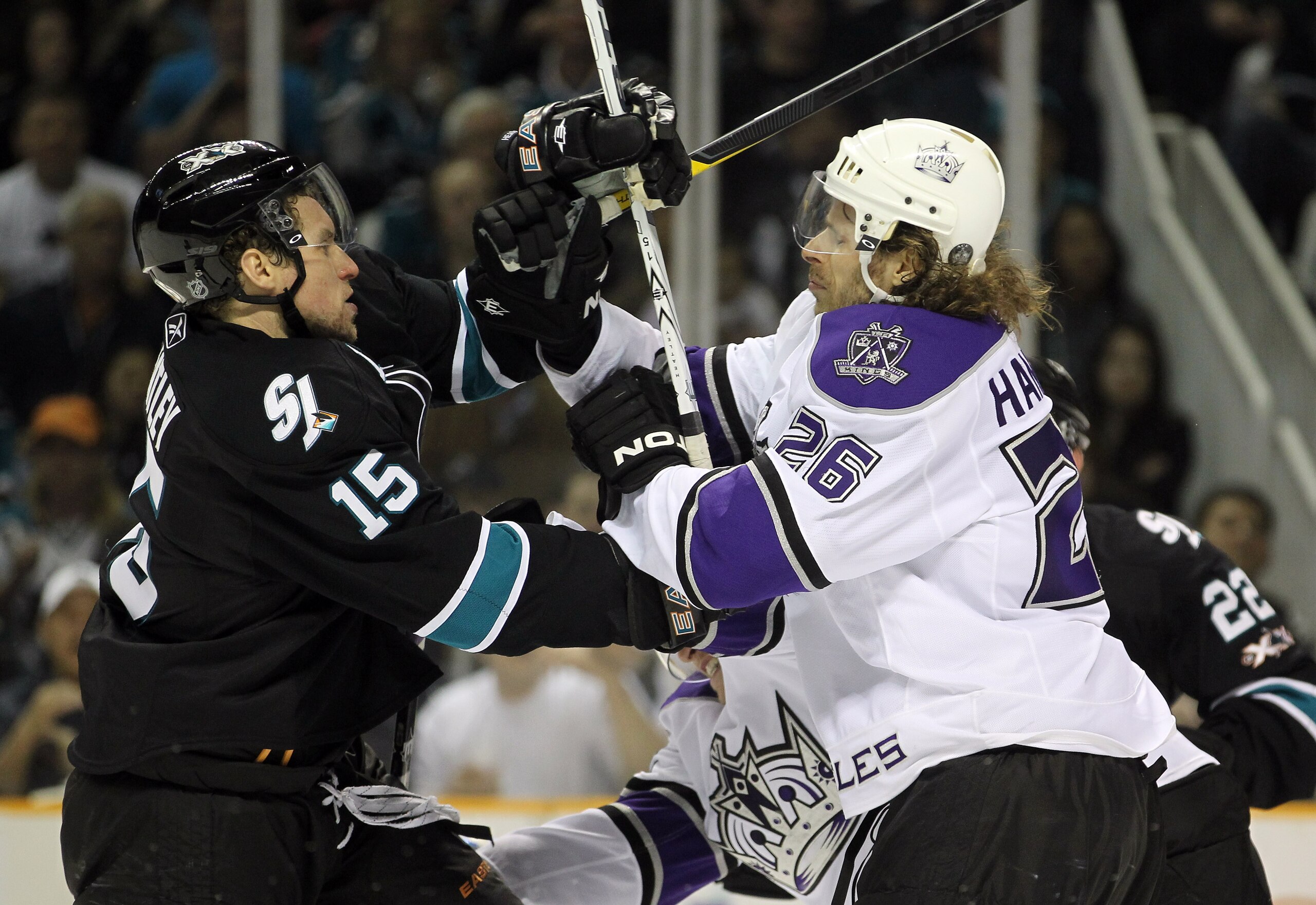 SAN JOSE, CA - APRIL 23: Dany Heatley #15 of the San Jose Sharks and Michal Handzus #26 of the Los Angeles Kings get in to a fight in game five of the Western Conference Quarterfinals during the 2011 NHL Stanley Cup Playoffs at HP Pavilion on April 23, 2 SAN JOSE, CA - APRIL 23: Dany Heatley #15 of the San Jose Sharks and Michal Handzus #26 of the Los Angeles Kings get in to a fight in game five of the Western Conference Quarterfinals during the 2011 NHL Stanley Cup Playoffs at HP Pavilion on April 23, 2