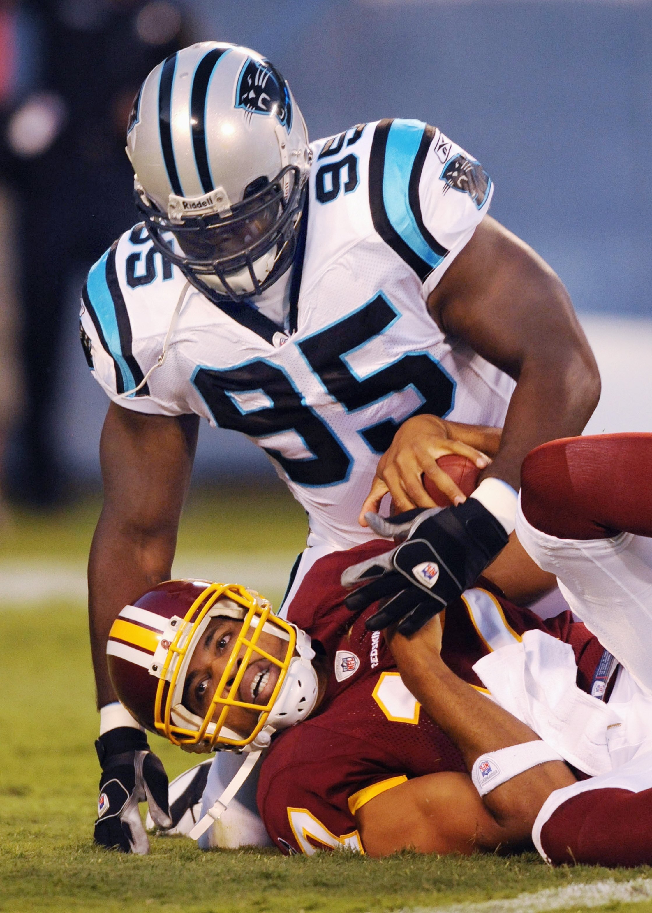CHARLOTTE, NC - AUGUST 23   Defensive end Charles Johnson #95 of the Carolina Panthers sacks Jason Campbell #17 of the Washington Redskins during the NFL preseason game at Bank of America Stadium on August, 23, 2008 in Charlotte, North Carolina. (Photo by