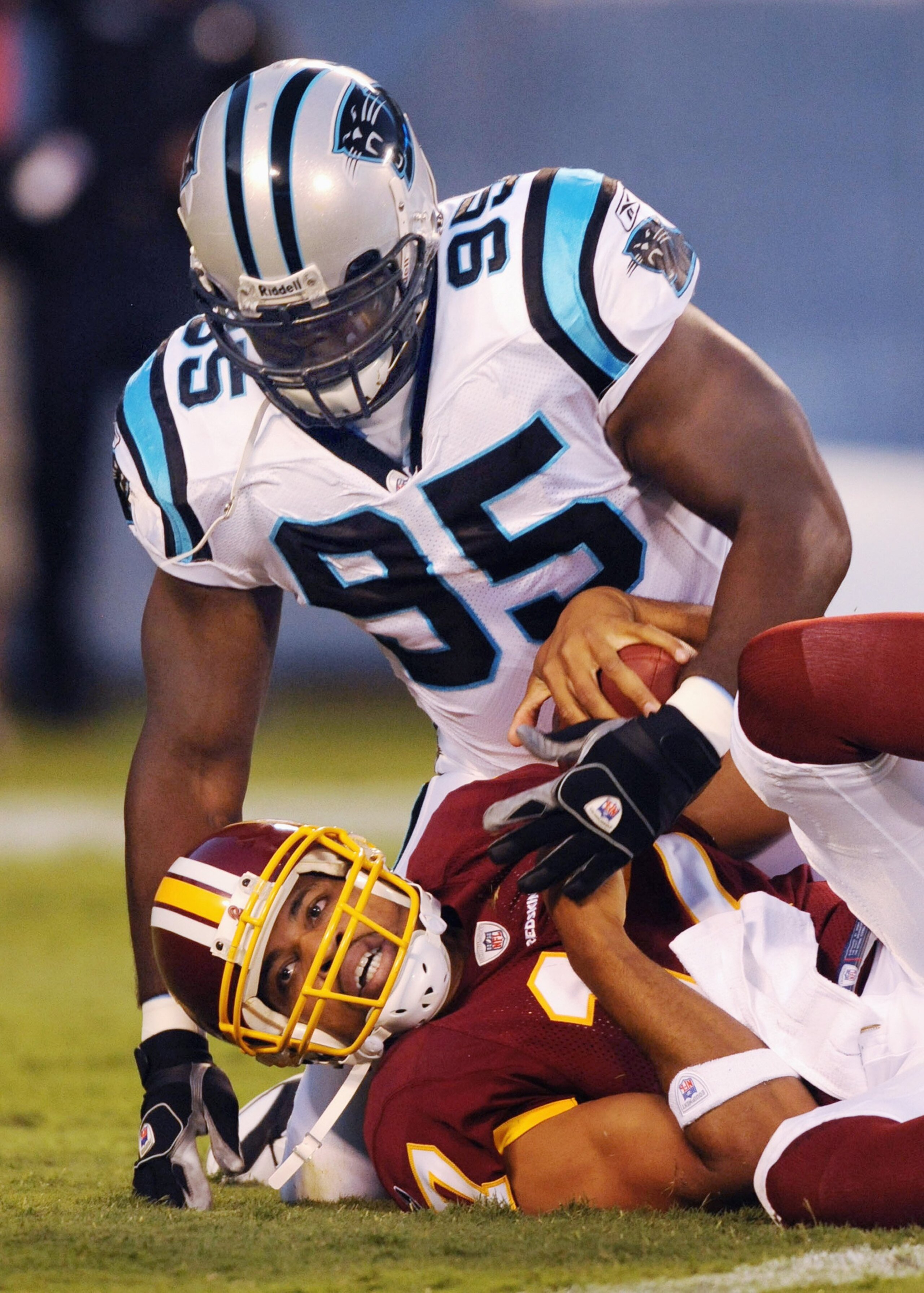CHARLOTTE, NC - AUGUST 23   Defensive end Charles Johnson #95 of the Carolina Panthers sacks Jason Campbell #17 of the Washington Redskins during the NFL preseason game at Bank of America Stadium on August, 23, 2008 in Charlotte, North Carolina. (Photo by