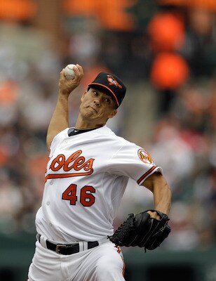 BALTIMORE, MD - APRIL 10:  Starting pitcher Jeremy Guthrie #46 of the Baltimore Orioles delivers to a Texas Rangers batter during the third inning at Oriole Park at Camden Yards on April 10, 2011 in Baltimore, Maryland.  (Photo by Rob Carr/Getty Images)