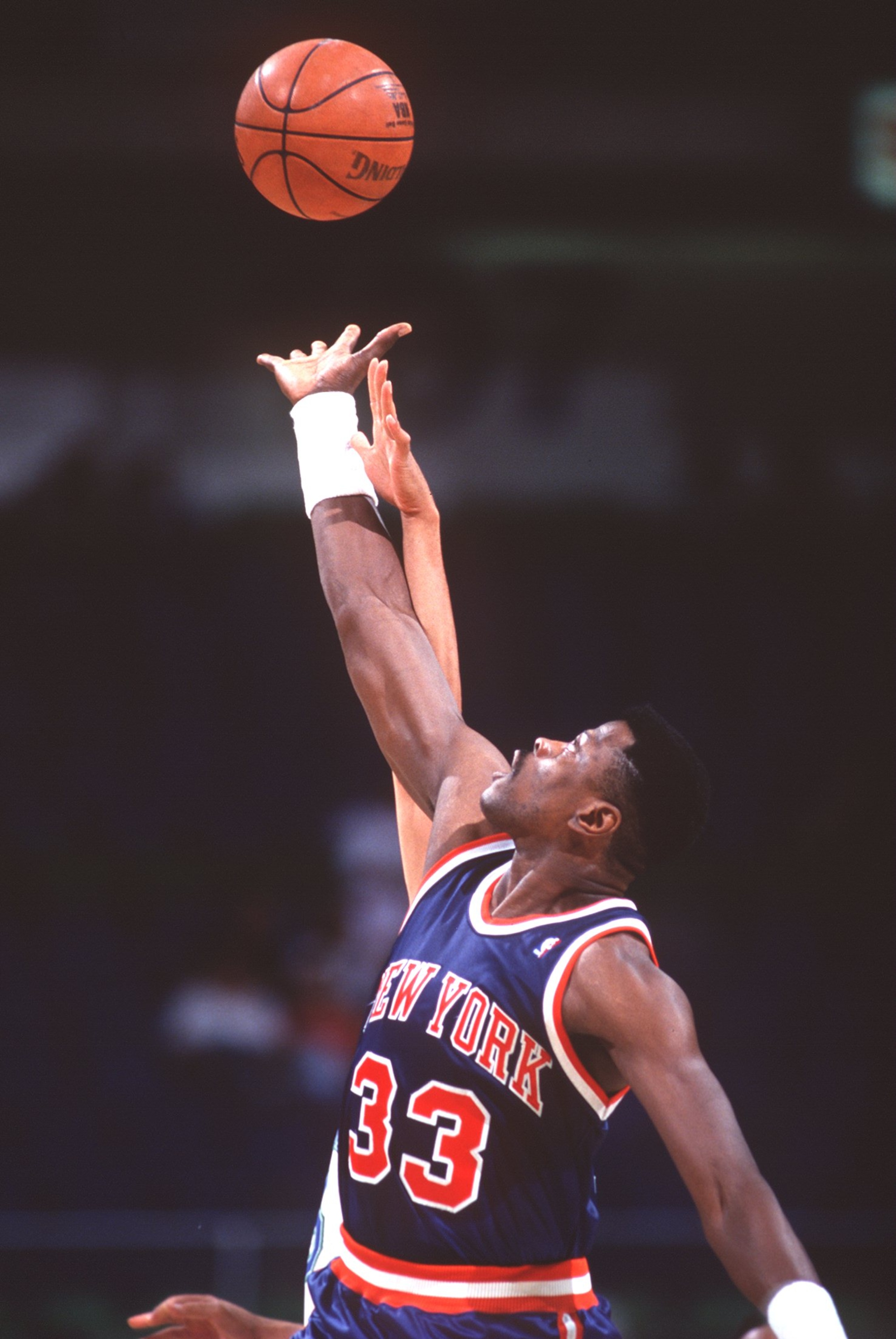 23 OCT 1992:  NEW YORK CENTER PATRICK EWING INVOLVED IN A JUMP BALL DURING THE KNICKS GAME AT THE DALLAS MAVERICKS. Mandatory Credit: Layne Murdoch/ALLSPORT