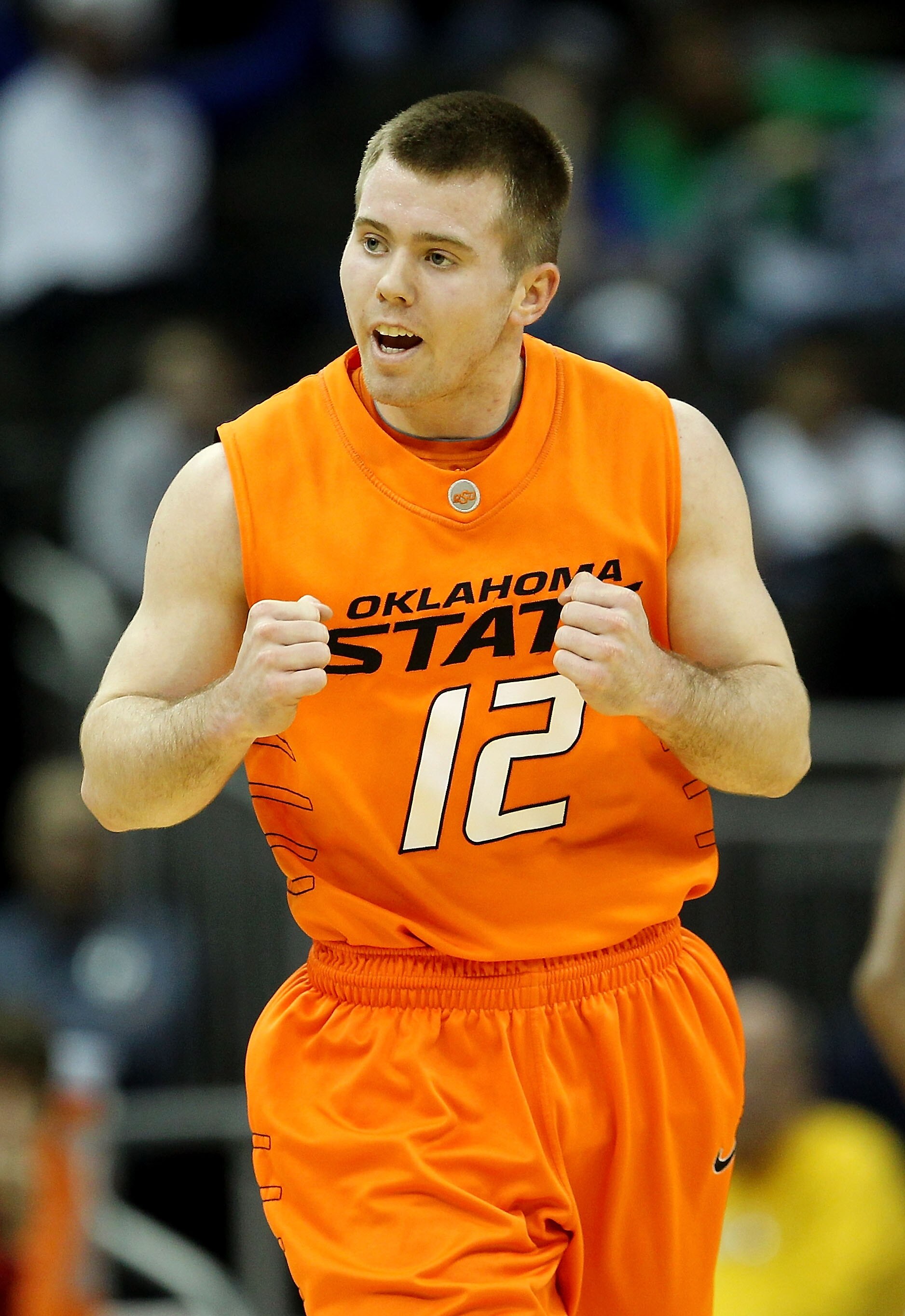 KANSAS CITY, MO - MARCH 09:  Keiton Page #12 of the Oklahoma State Cowboys reacts after a play in the first half of their game against the Nebraska Cornhuskers during the first round of the 2011 Phillips 66 Big 12 Men's Basketball Tournament at Sprint Cen