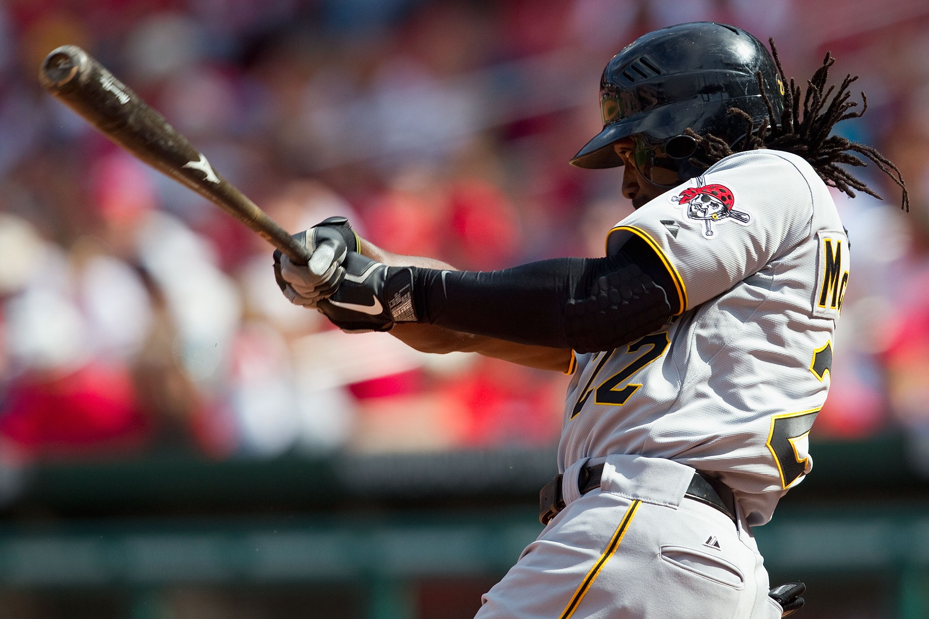 ST. LOUIS, MO - APRIL 6: Andrew McCutchen #22 of the Pittsburgh Pirates hits a single against the St. Louis Cardinals at Busch Stadium on April 6, 2011 in St. Louis, Missouri.  (Photo by Dilip Vishwanat/Getty Images)