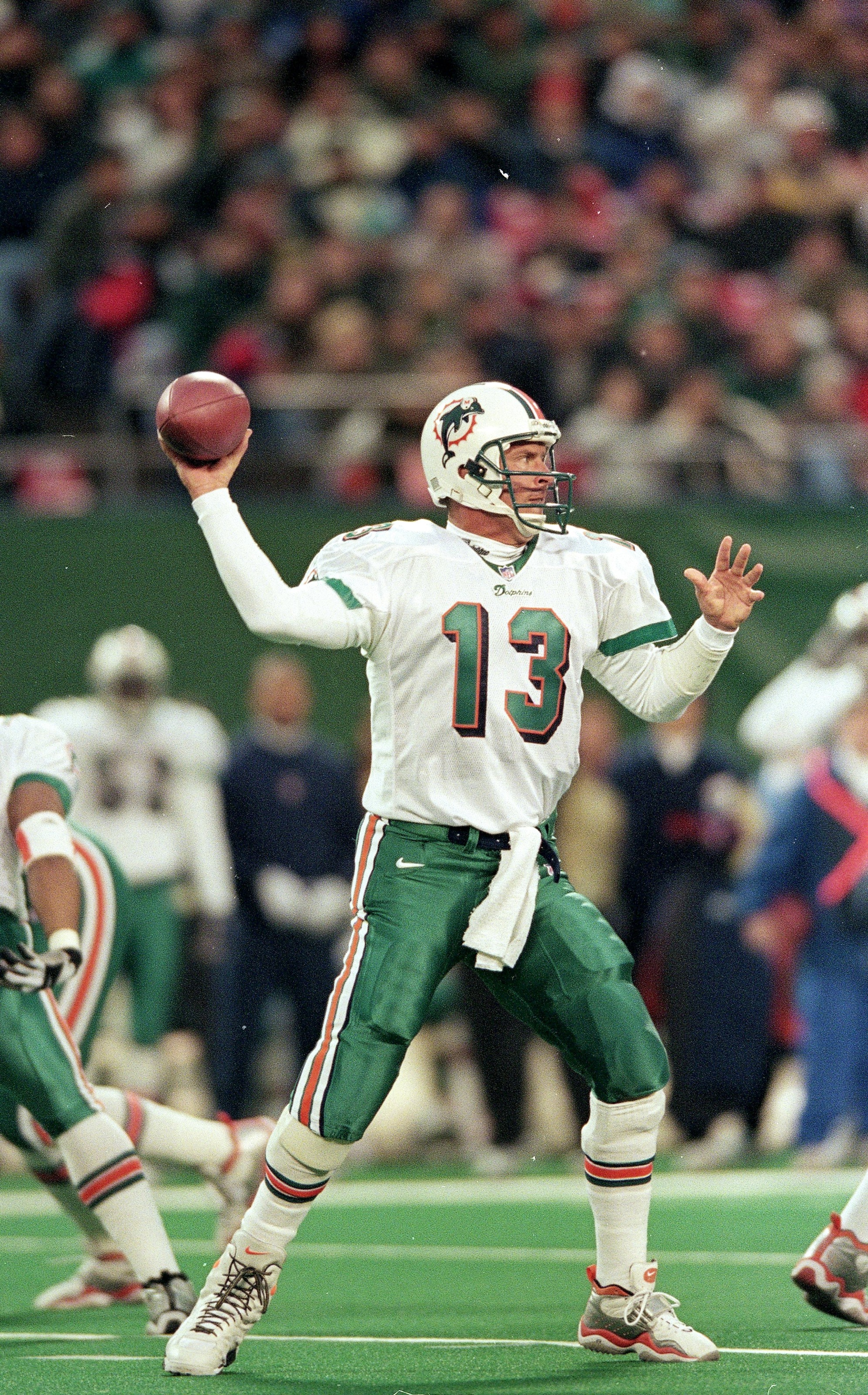 12 Dec 1999:  Dan Marino #13 of the Miami Dolphins gets ready to pass the ball during the game against the New York Jets at the Meadowlands in East Rutherford, New Jersey. The Jets defeated the Dolphins 28-20. Mandatory Credit: Al Bello  /Allsport