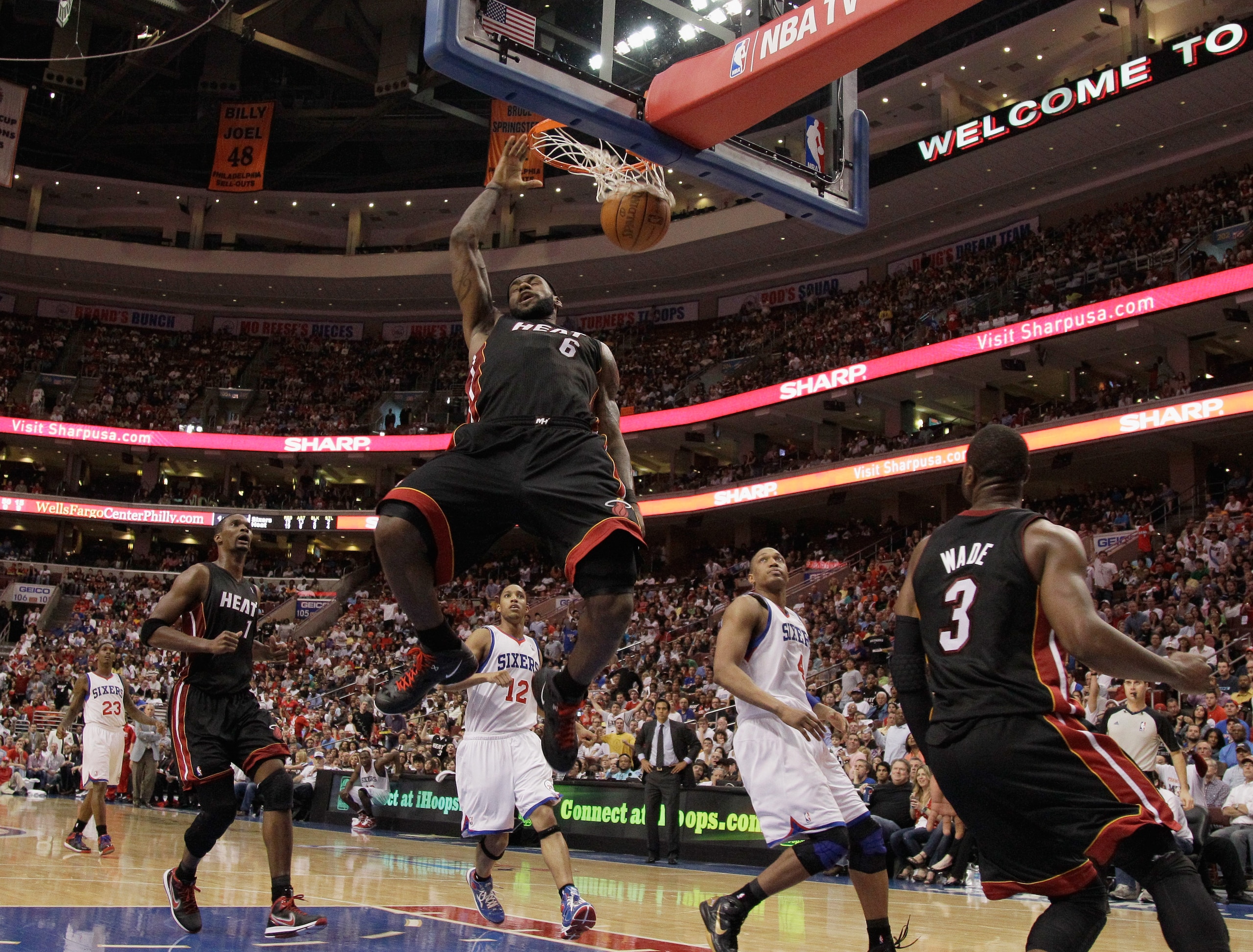 PHILADELPHIA, PA - APRIL 24:  LeBron James #6 of the Miami Heat dunks against the Philadelphia 76ers in Game Four of the Eastern Conference Quarterfinals in the 2011 NBA Playoffs at Wells Fargo Center on April 24, 2011 in Philadelphia, Pennsylvania. NOTE
