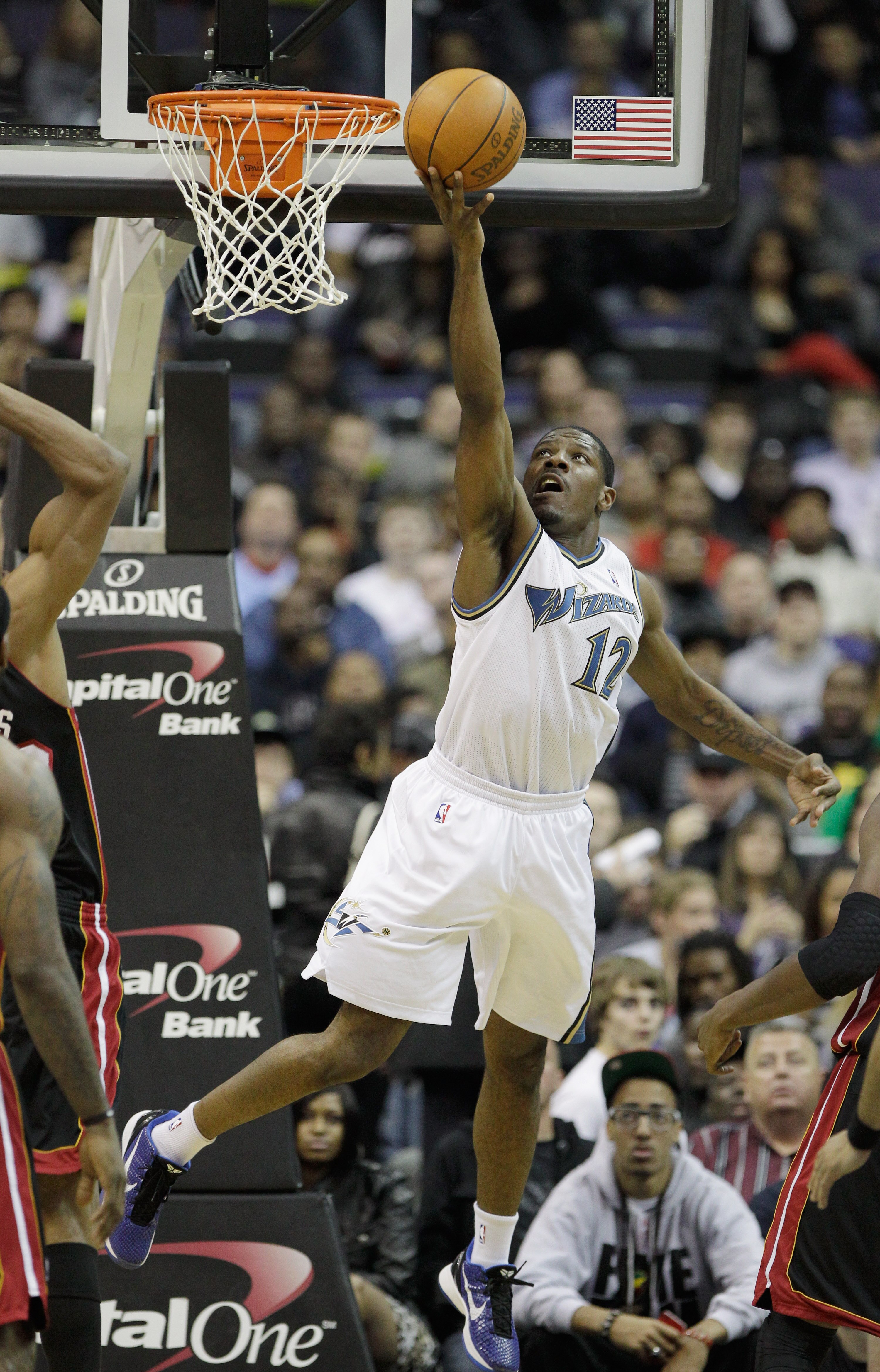WASHINGTON, DC - MARCH 30: Othyus Jeffers #12 of the Washington Wizards puts up a shot against the Miami Heat at the Verizon Center on March 30, 2011 in Washington, DC. NOTE TO USER: User expressly acknowledges and agrees that, by downloading and/or using