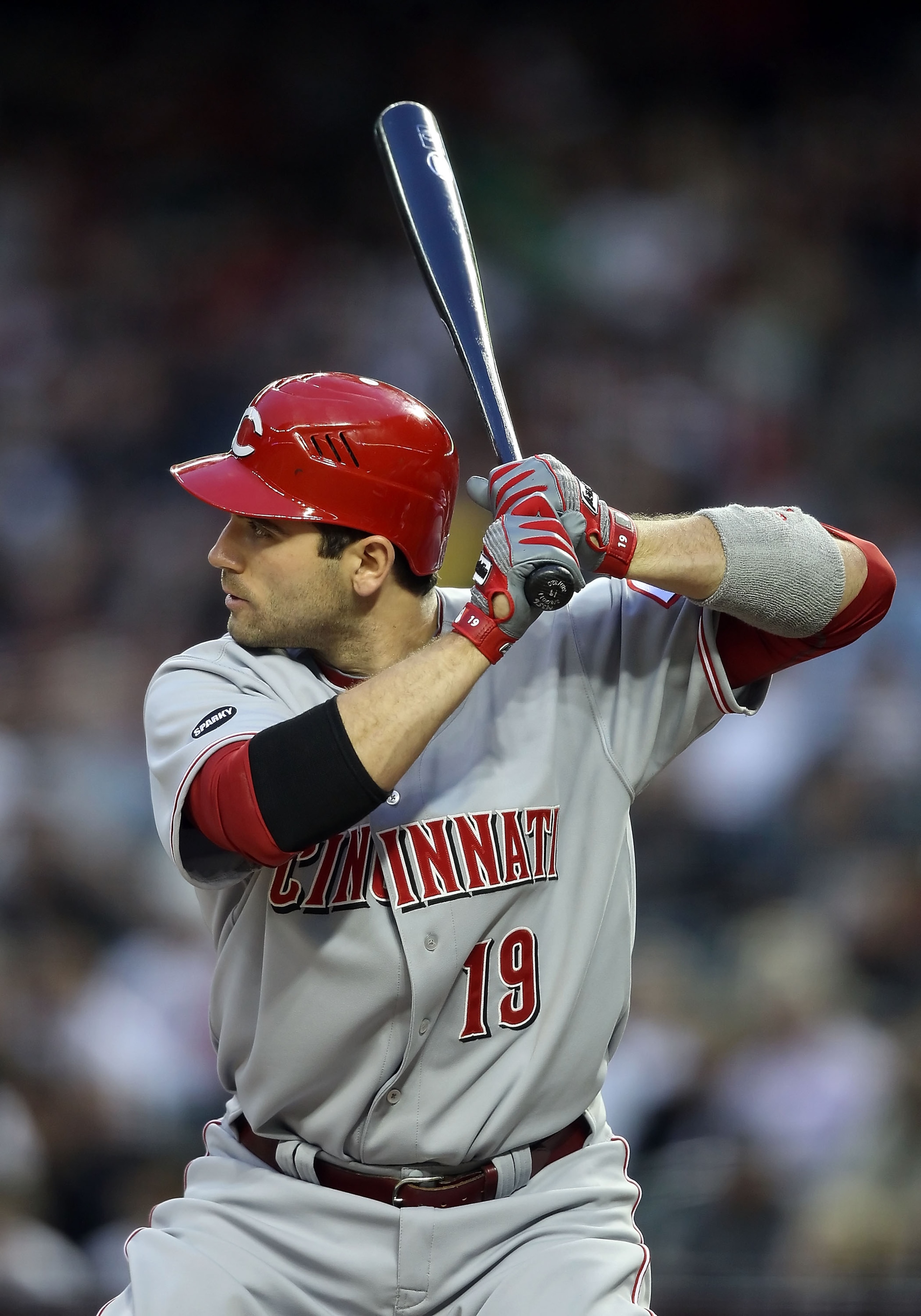 PHOENIX, AZ - APRIL 08:  Joey Votto #19 of the Cincinnati Reds at bat during the Major League Baseball home opening game against the Arizona Diamondbacks at Chase Field on April 8, 2011 in Phoenix, Arizona. The Diamondbacks defeated the Reds 13-2.  (Photo