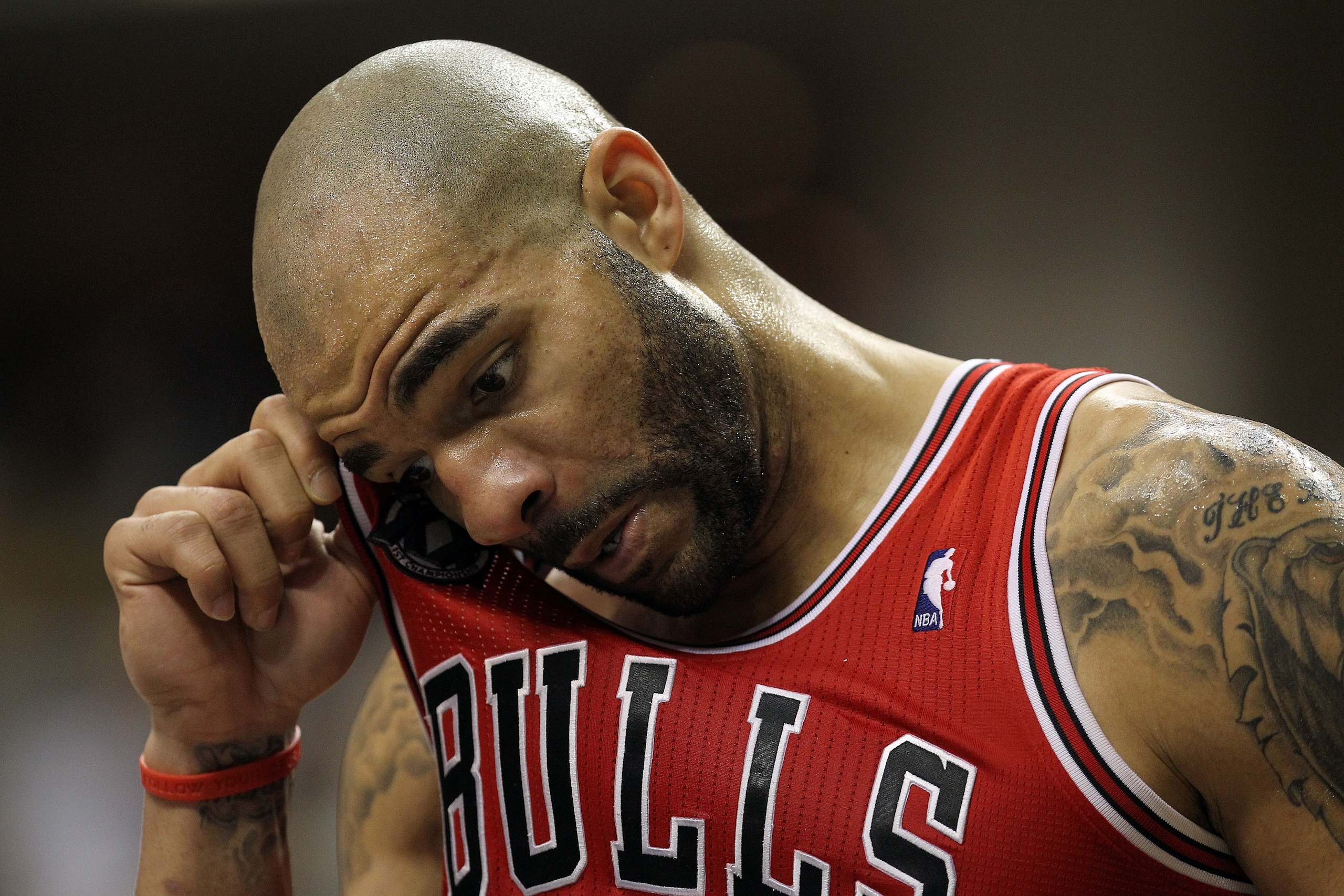 INDIANAPOLIS, IN - APRIL 21:  Carlos Boozer #5 of the Chicago Bulls wipes his head during the game against the Indiana Pacers in Game three of the Eastern Conference Quarterfinals in the 2011 NBA Playoffs on April 21, 2011  at Conseco Fieldhouse in Indian