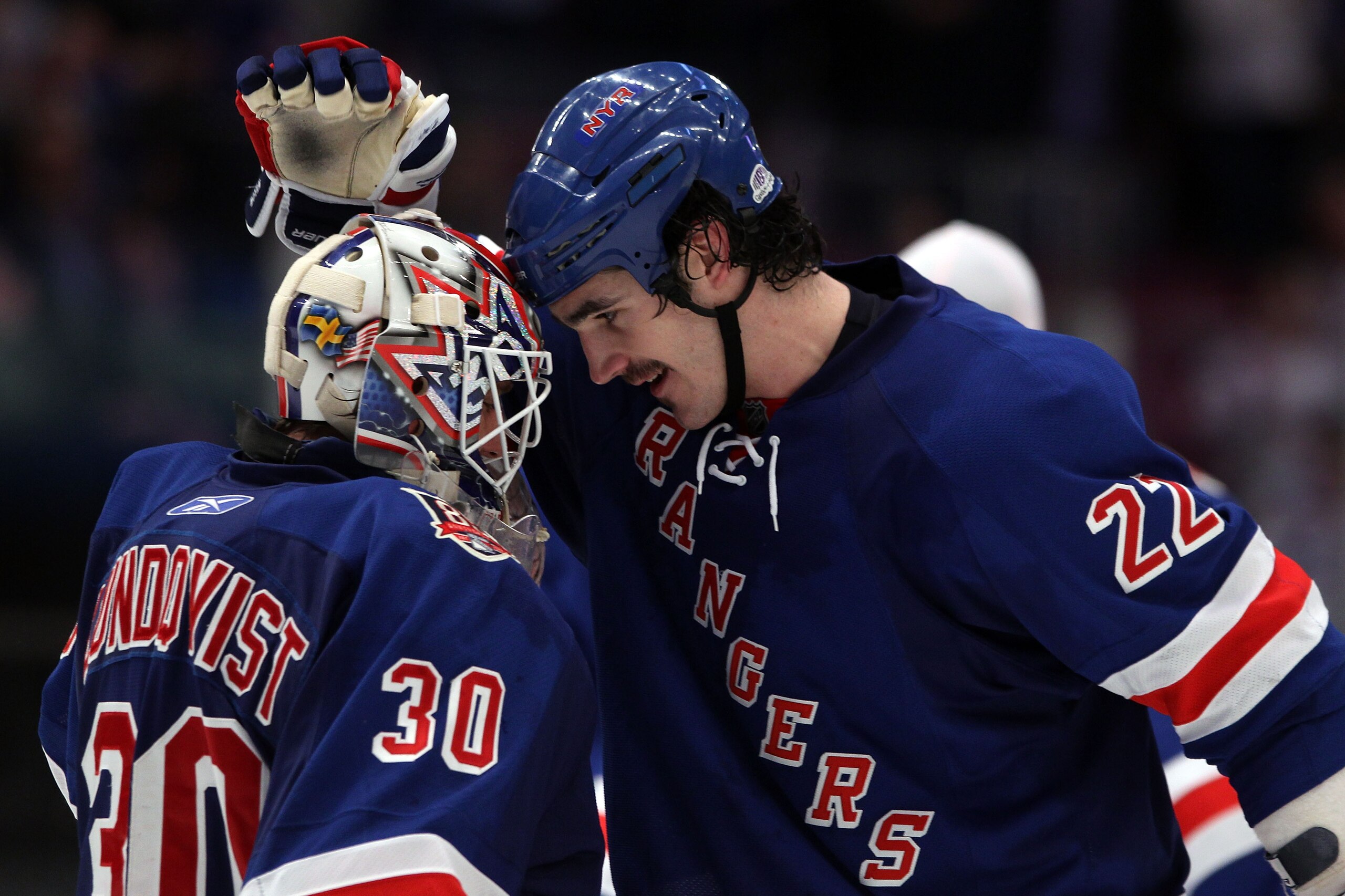 NEW YORK, NY - APRIL 17:  (L-R) Goalie Henrik Lundqvist #30 and Brian Boyle #22 of the New York Rangers celebrate after the Rangers won 3-2 against the Washington Capitals in Game Three of the Eastern Conference Quarterfinals during the 2011 NHL Stanley C