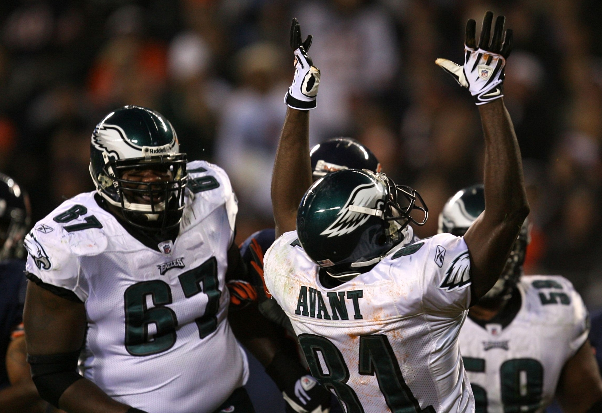 CHICAGO - NOVEMBER 22: Jamaal Jackson #67 and Jason Avant #81 of the Philadelphia Eagles celebrate after Avant scored a 13-yard touchdown reception in the first quarter against the Chicago Bears at Soldier Field on November 22, 2009 in Chicago, Illinois.