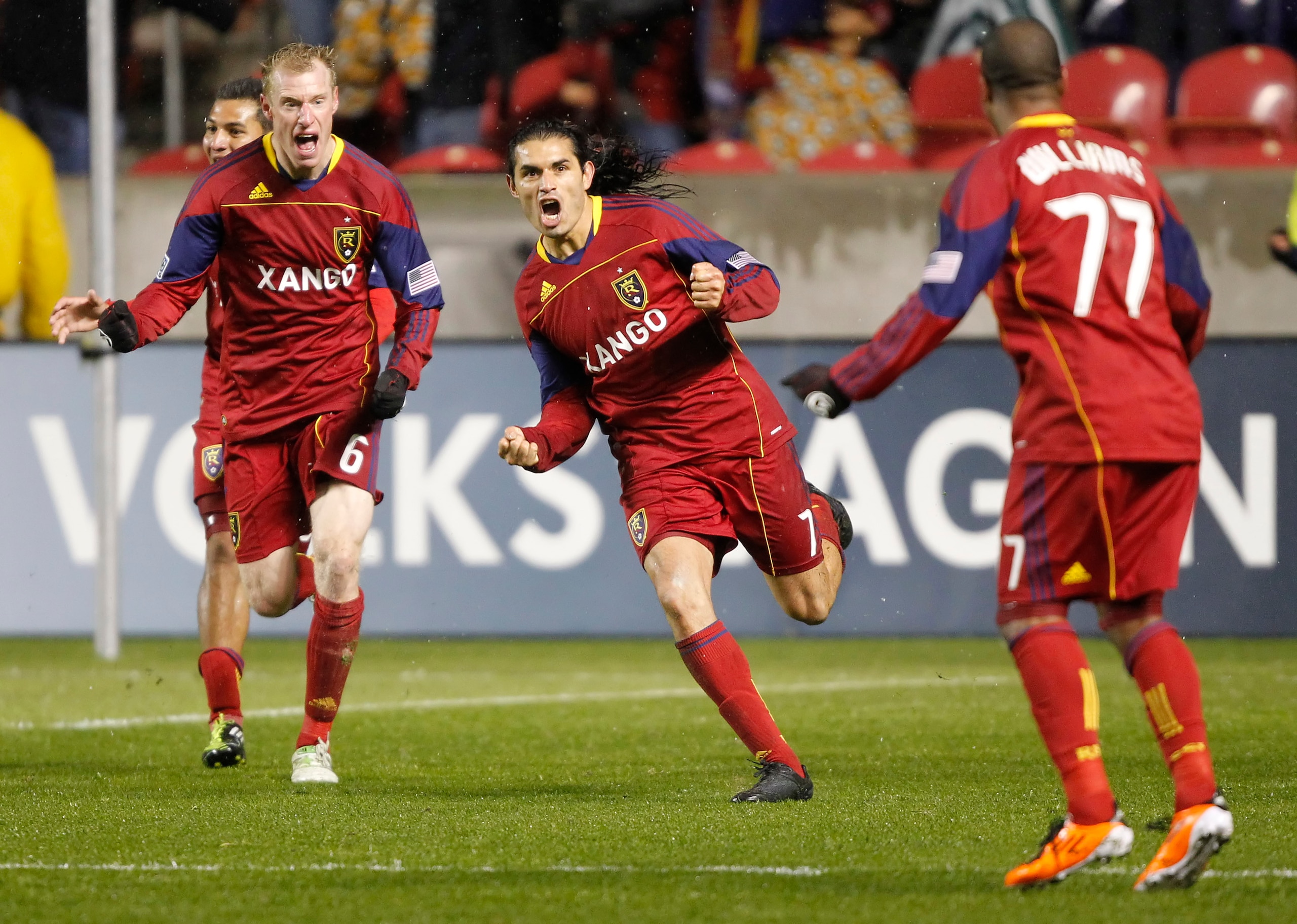 SANDY, UT - APRIL 13:  Fabian Espindola #7, Andy Williams #77 and Nat Borchers #6 of Real Salt Lake celebrates Espindola game-winning goal in the last minutes against the Colorado Rapids during the second half of an MLS soccer game April 13, 2010 at Rio T