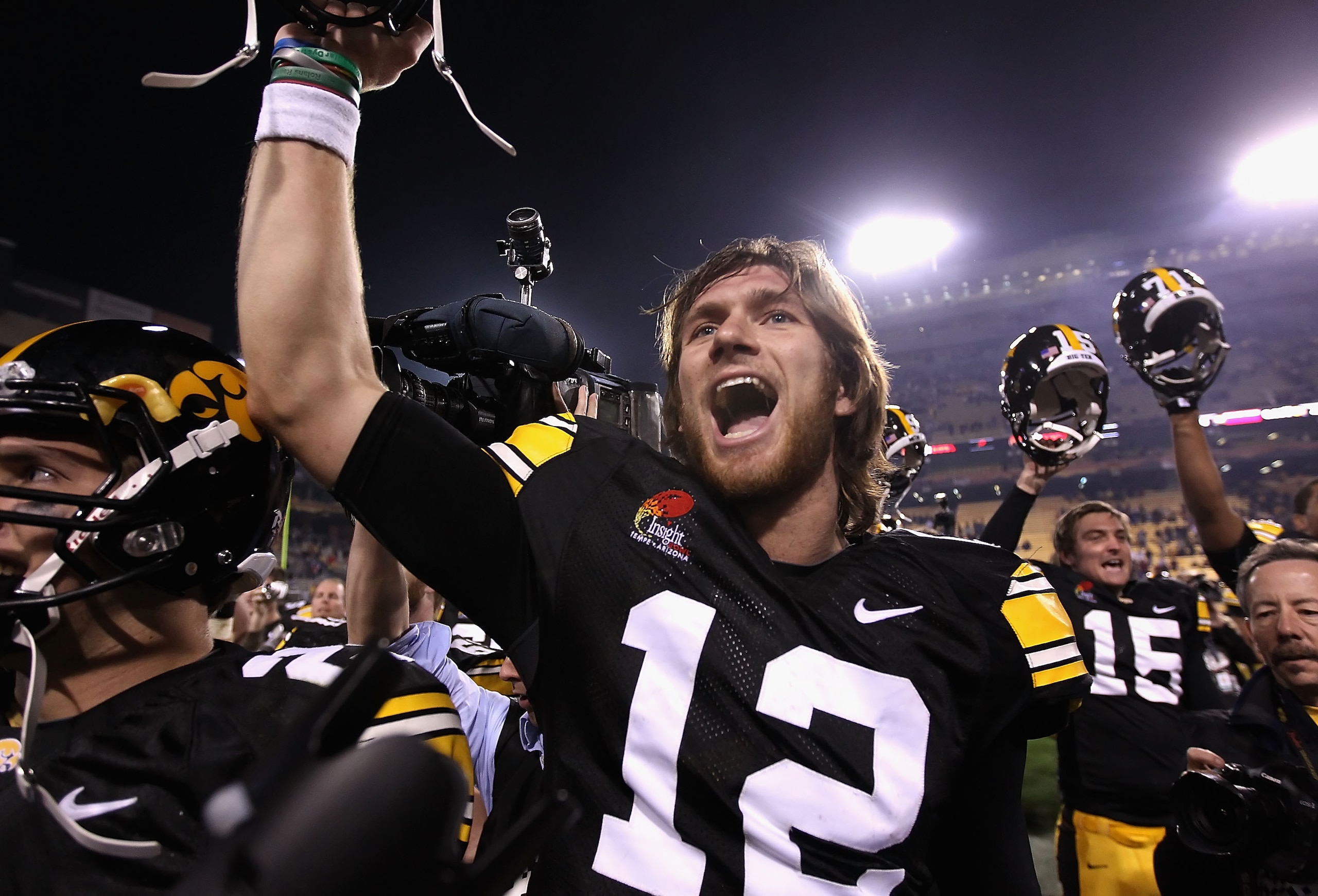 TEMPE, AZ - DECEMBER 28: Quarterback Ricky Stanzi #12 of the Iowa Hawkeyes celebrates with teammates after defeating the Missouri Tigers in the Insight Bowl at Sun Devil Stadium on December 28, 2010 in Tempe, Arizona. The Hawkeyes defeated the Tigers 27- TEMPE, AZ - DECEMBER 28: Quarterback Ricky Stanzi #12 of the Iowa Hawkeyes celebrates with teammates after defeating the Missouri Tigers in the Insight Bowl at Sun Devil Stadium on December 28, 2010 in Tempe, Arizona. The Hawkeyes defeated the Tigers 27-