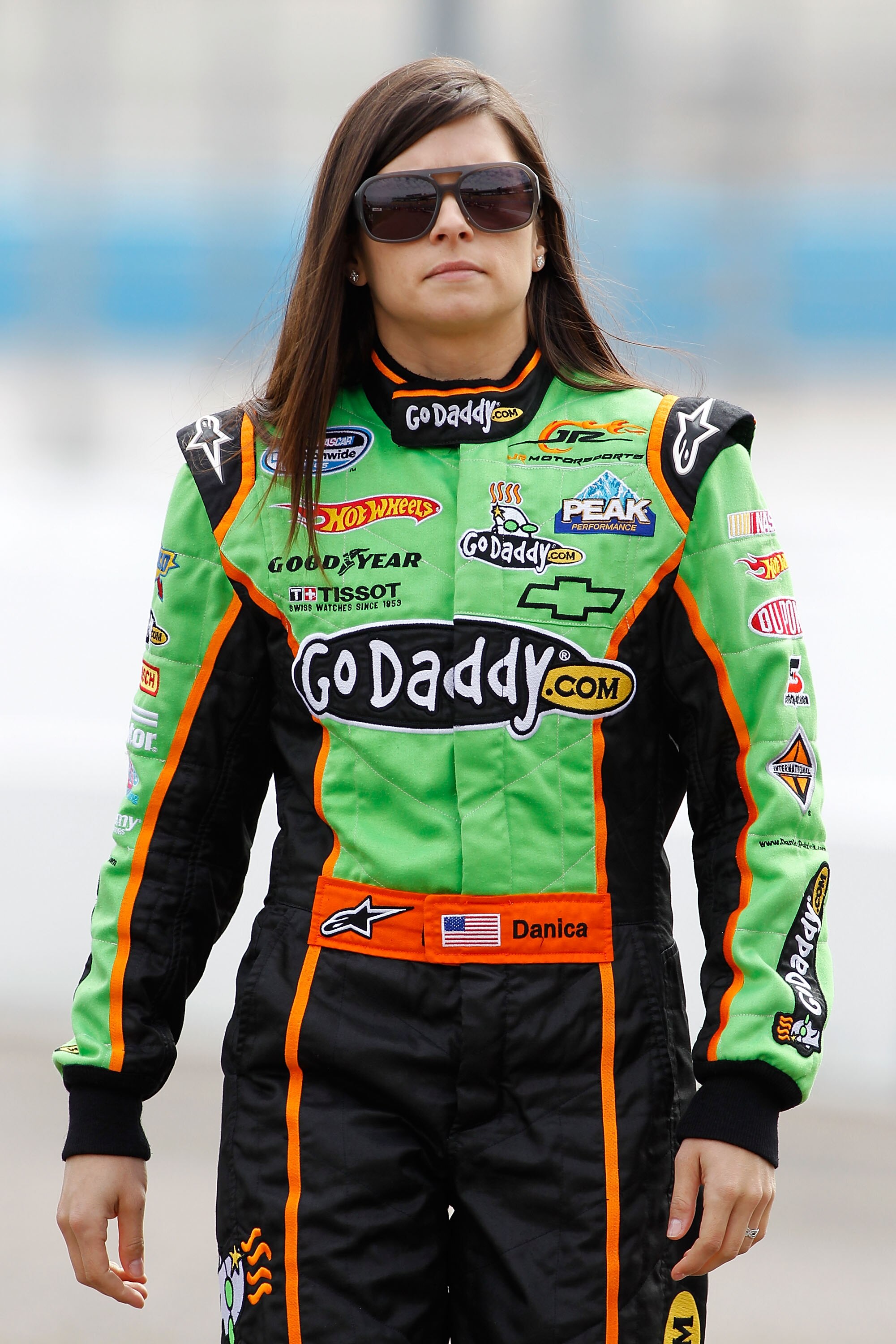 AVONDALE, AZ - FEBRUARY 26:  Danica Patrick, driver of the #7 GoDaddy.com Chevrolet, walks on pit road during qualifying for the NASCAR Nationwide Series Bashas' Supermarkets 200 at Phoenix International Raceway on February 26, 2011 in Avondale, Arizona.