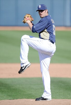 PEORIA, AZ - MARCH 02:  Chad Qualls #52 of the  San Diego Padres pitches against the Colorado Rockies during spring training at Peoria Stadium on March 2, 2011 in Peoria, Arizona.  (Photo by Harry How/Getty Images)