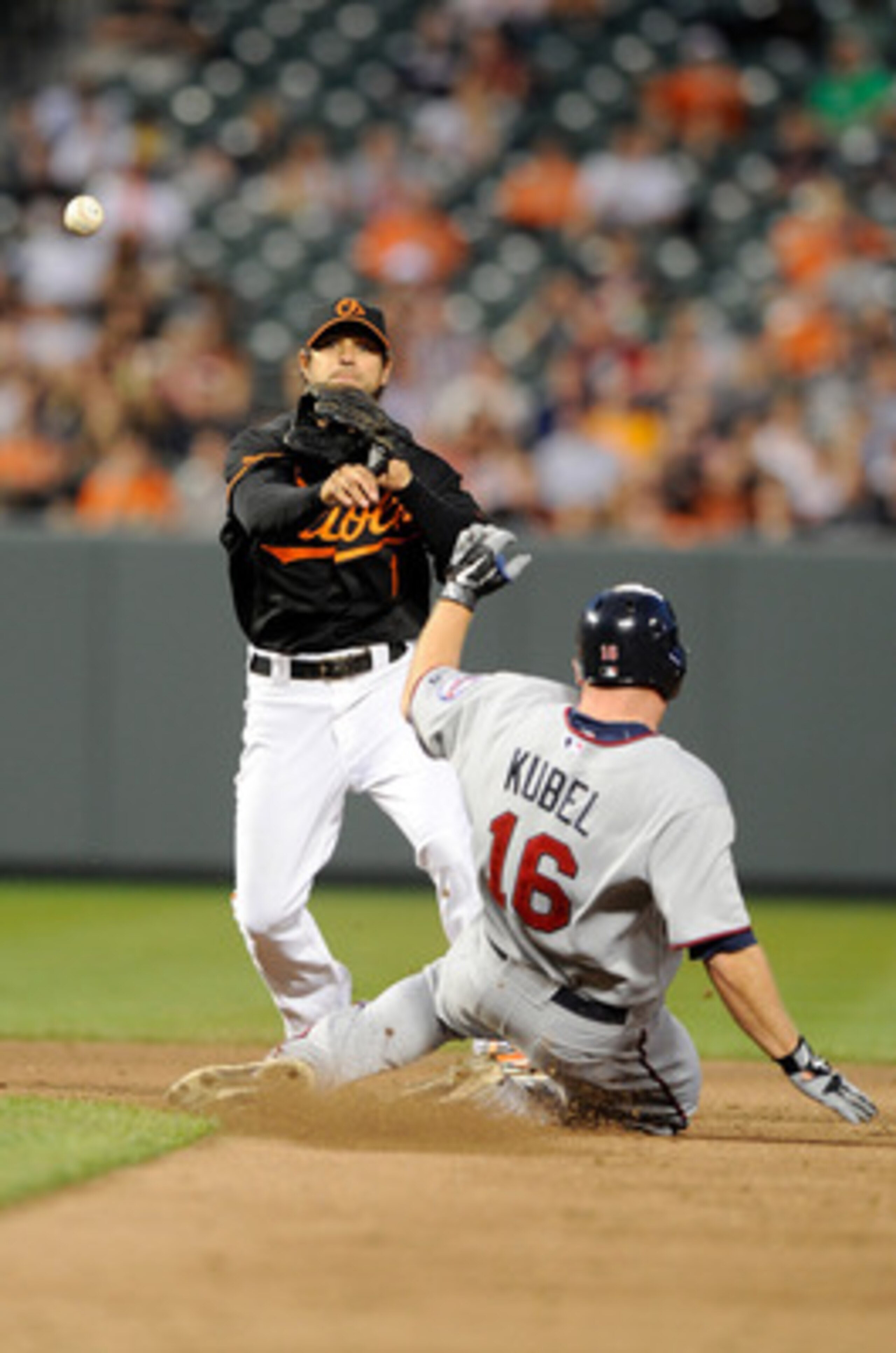 BALTIMORE, MD - APRIL 20:  Brian Roberts #1 of the Baltimore Orioles forces out Jason Kubel #16 of the Minnesota Twins to start a double play at Oriole Park at Camden Yards on April 20, 2011 in Baltimore, Maryland.  (Photo by Greg Fiume/Getty Images)