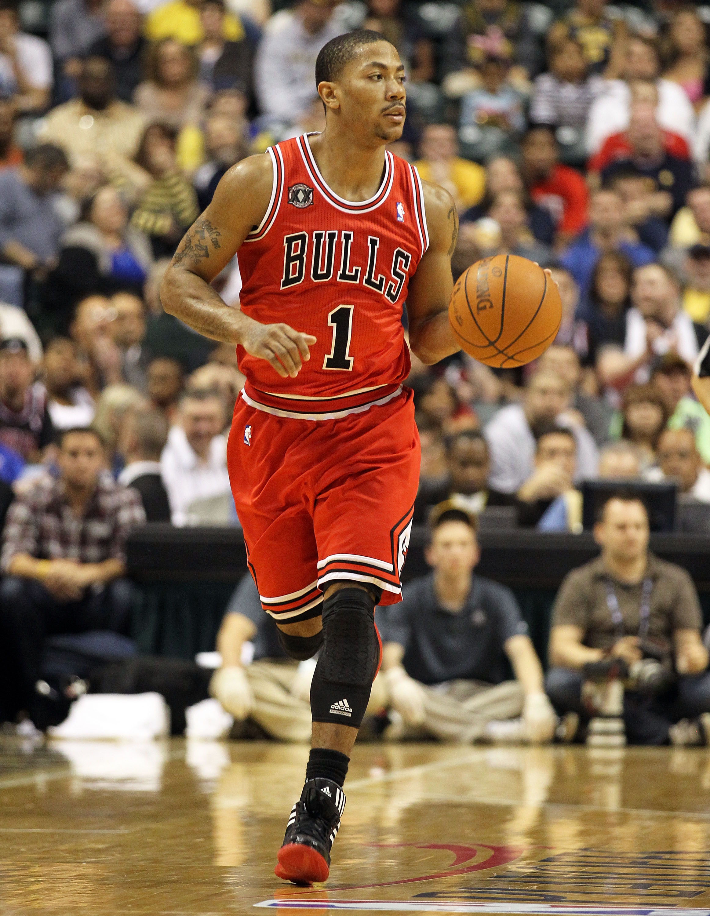 INDIANAPOLIS, IN - APRIL 21:  Derrick Rose #1 of the Chicago Bulls dribbles the ball against the Indiana Pacers in Game three of the Eastern Conference Quarterfinals in the 2011 NBA Playoffs on April 21, 2011  at Conseco Fieldhouse in Indianapolis, Indian