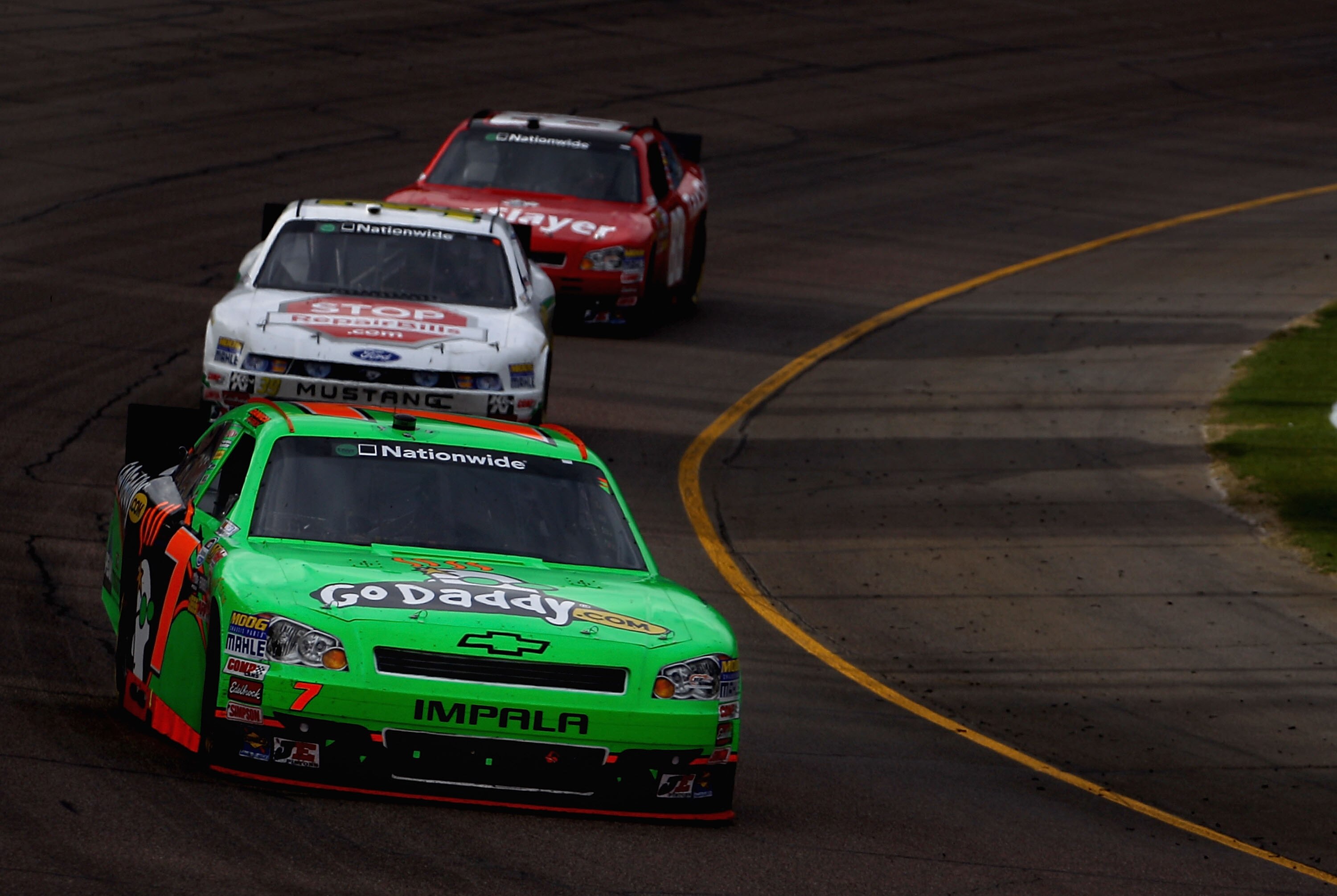 AVONDALE, AZ - FEBRUARY 26:  Danica Patrick, driver of the #7 GoDaddy.com Chevrolet, races during the NASCAR Nationwide Series Bashas' Supermarkets 200 at Phoenix International Raceway on February 26, 2011 in Avondale, Arizona.  (Photo by Christian Peters