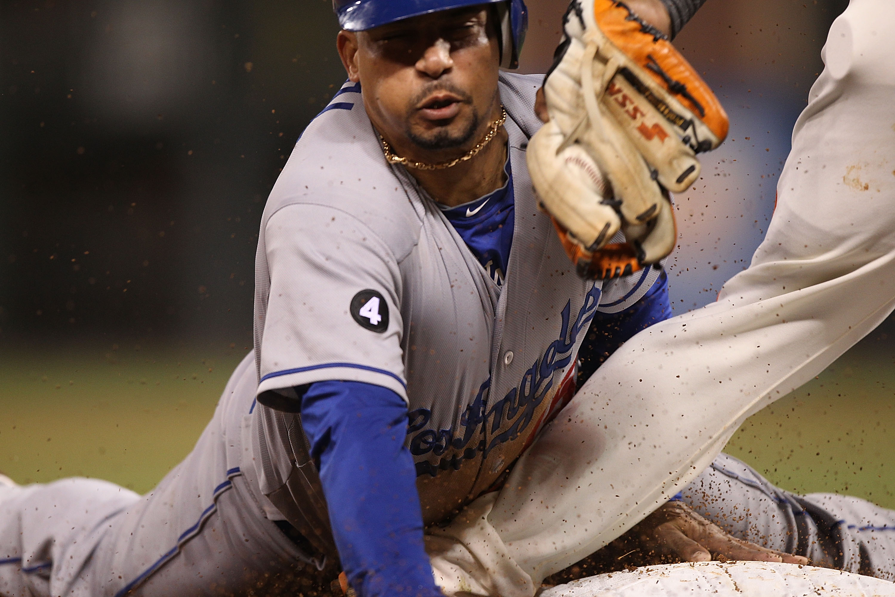 SAN FRANCISCO, CA - APRIL 11:  Rafael Furcal #15 of the Los Angeles Dodgers steals third base in the fifth inning against the San Francisco Giants during an MLB game at AT&T Park on April 11, 2011 in San Francisco, California.  Furcal would break his left
