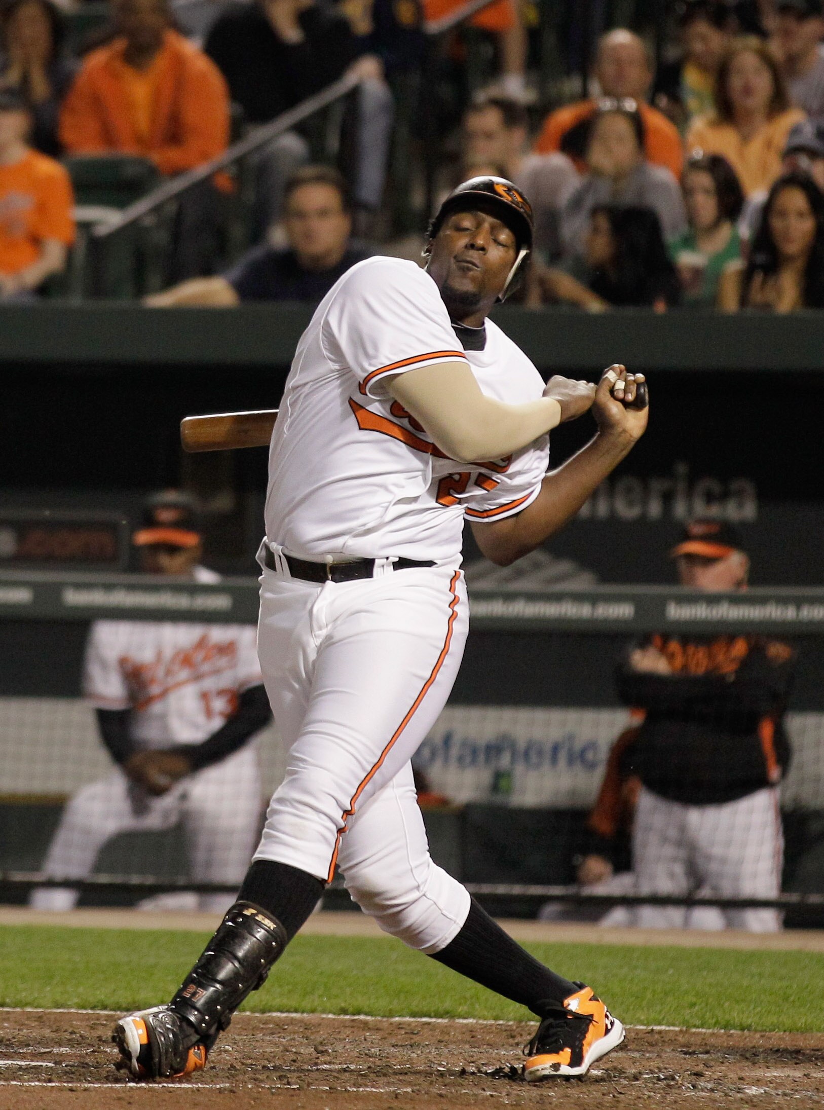 BALTIMORE, MD - APRIL 23:  Vladimir Guerrero #27 of the Baltimore Orioles swings at a pitch against the New York Yankees at Oriole Park at Camden Yards on April 23, 2011 in Baltimore, Maryland.  (Photo by Rob Carr/Getty Images)
