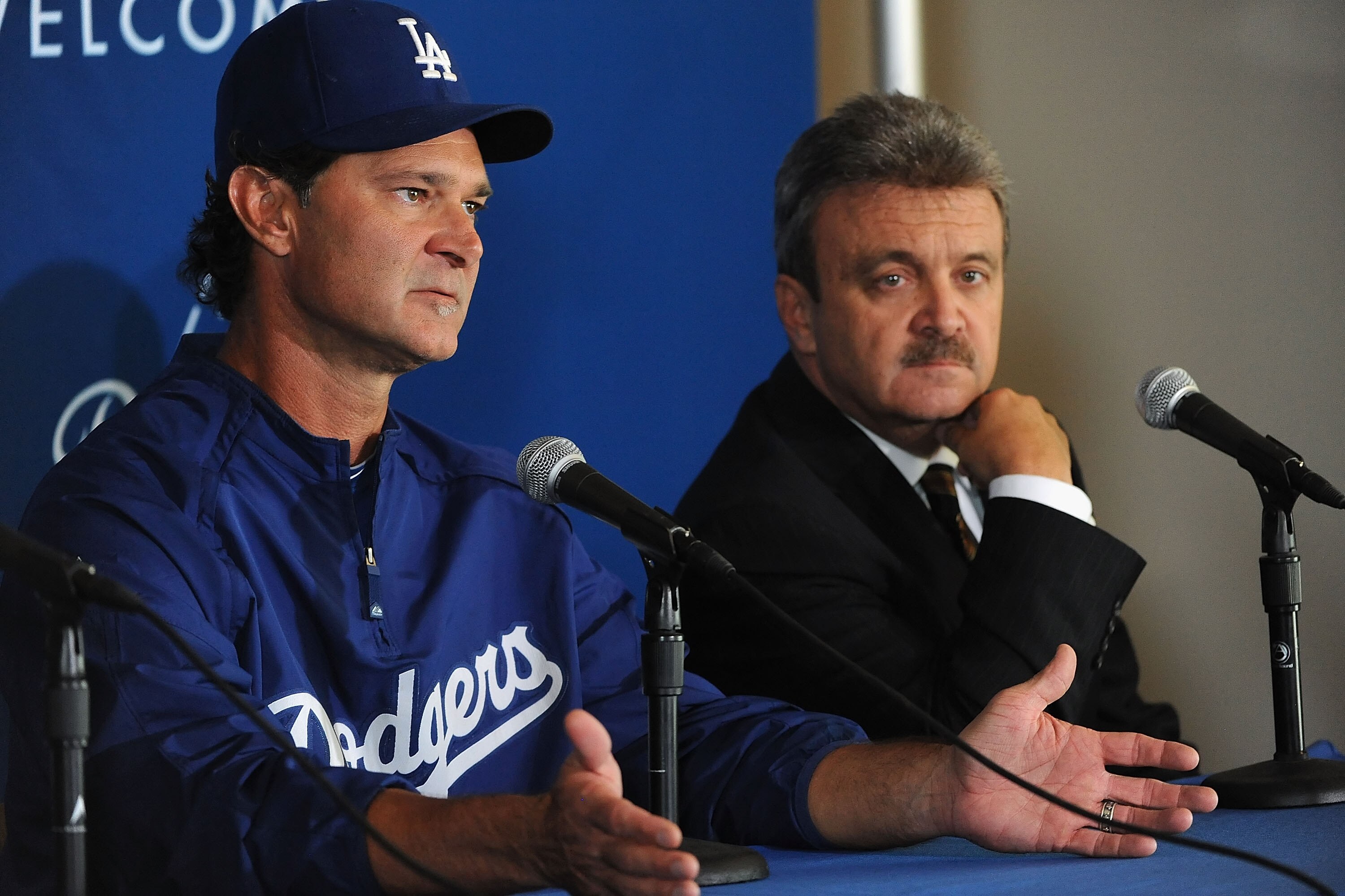 LOS ANGELES, CA - SEPTEMBER 17:  Coach Don Mattingly (L) and general manager Ned Colletti of the Los Angeles Dodgers attend a press conference announcing that Mattingly will manage the Dodgers in 2011 after Joe Torre retires at Dodger Stadium on September