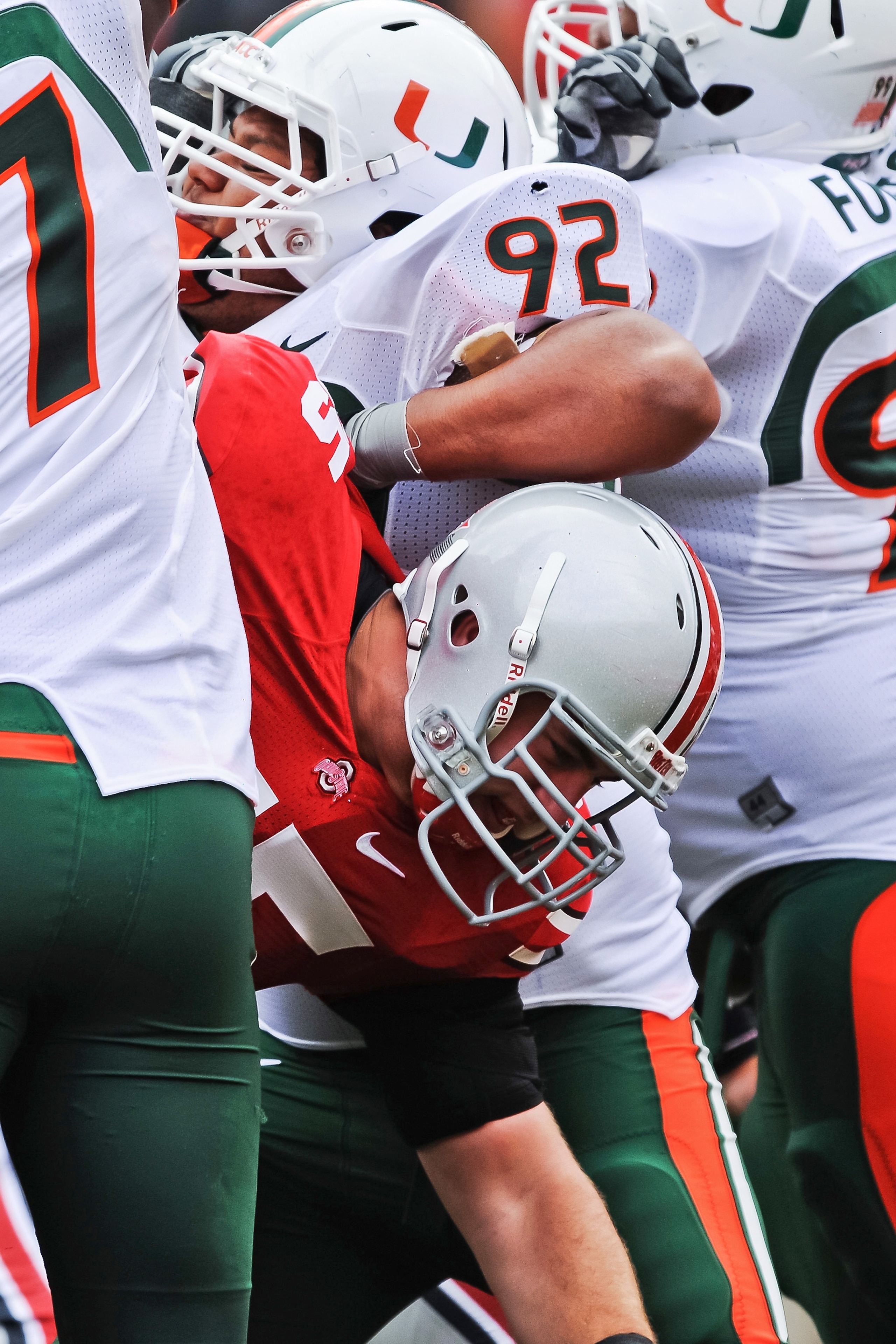 COLUMBUS, OH - SEPTEMBER 11: Andy Miller #55 of the Ohio State Buckeyes blocks during a field goal attempt against the Miami Hurricanes at Ohio Stadium on September 11, 2010 in Columbus, Ohio. (Photo by Jamie Sabau/Getty Images) COLUMBUS, OH - SEPTEMBER 11: Andy Miller #55 of the Ohio State Buckeyes blocks during a field goal attempt against the Miami Hurricanes at Ohio Stadium on September 11, 2010 in Columbus, Ohio. (Photo by Jamie Sabau/Getty Images)