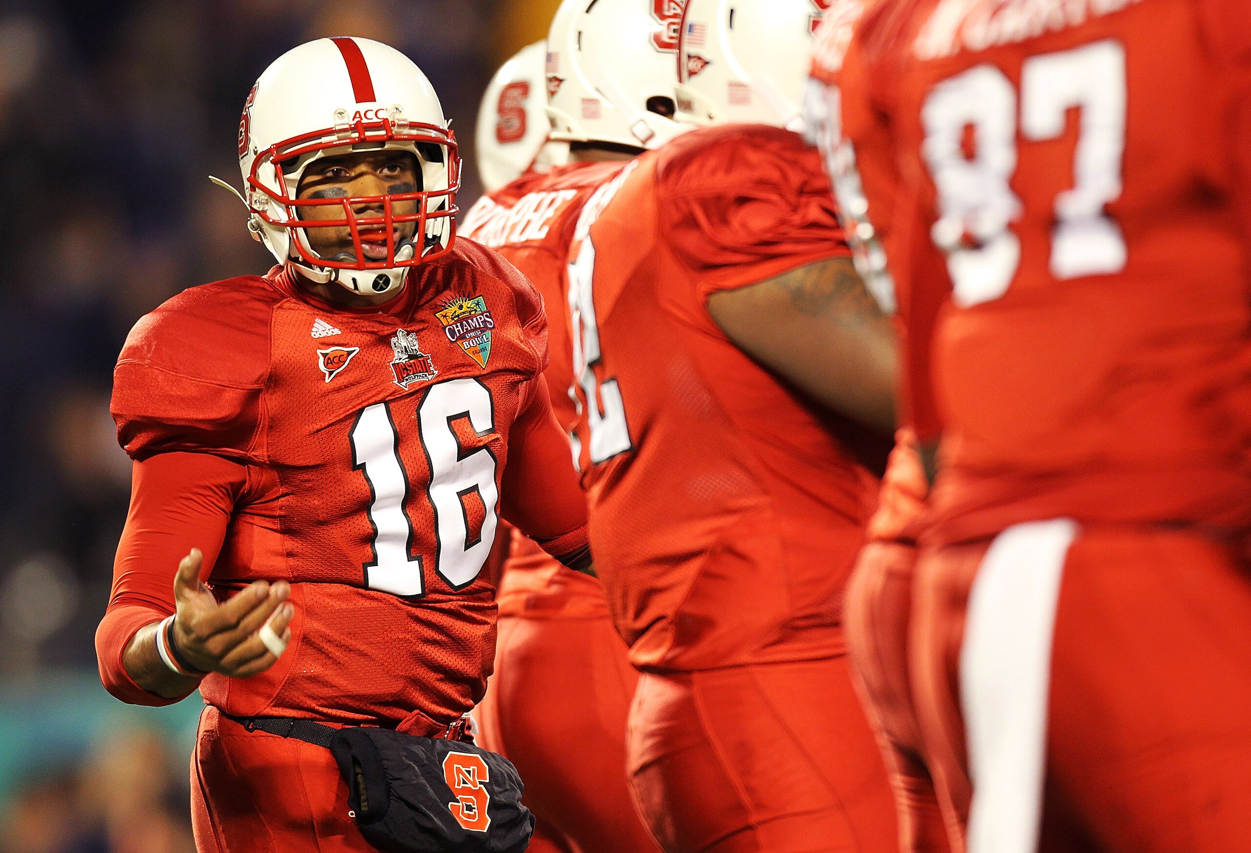 ORLANDO, FL - DECEMBER 28: Russell Wilson #16 of the North Carolina State Wolfpack calls a play during the Champs Sports Bowl against the West Virginia Mountineers at Florida Citrus Bowl Stadium on December 28, 2010 in Orlando, Florida. (Photo by Mike E ORLANDO, FL - DECEMBER 28: Russell Wilson #16 of the North Carolina State Wolfpack calls a play during the Champs Sports Bowl against the West Virginia Mountineers at Florida Citrus Bowl Stadium on December 28, 2010 in Orlando, Florida. (Photo by Mike E