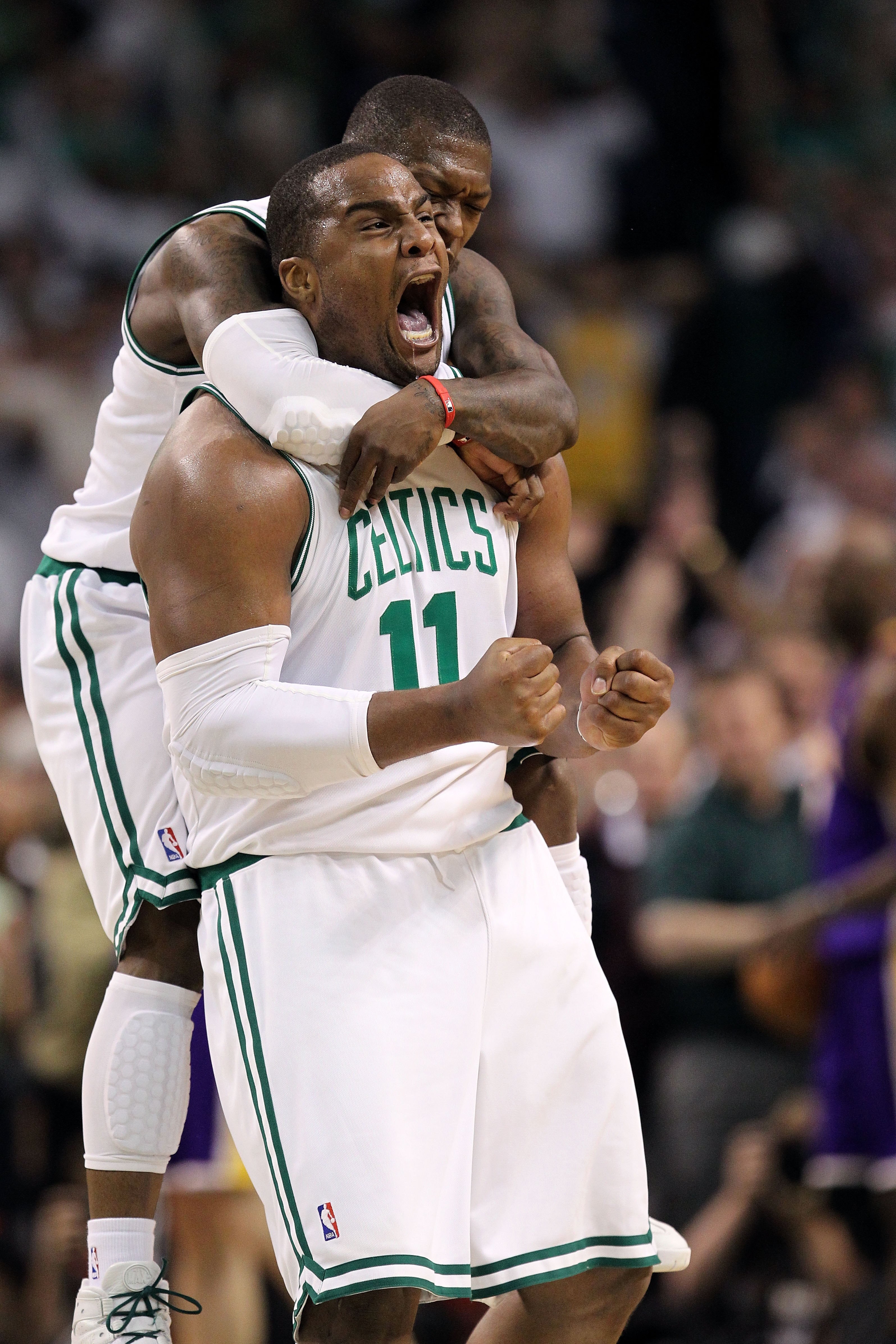 BOSTON - JUNE 10:  Glen Davis #11 and Nate Robinson #4 of the Boston Celtics react in the fourth quarter against the Los Angeles Lakers during Game Four of the 2010 NBA Finals on June 10, 2010 at TD Garden in Boston, Massachusetts. NOTE TO USER: User expr