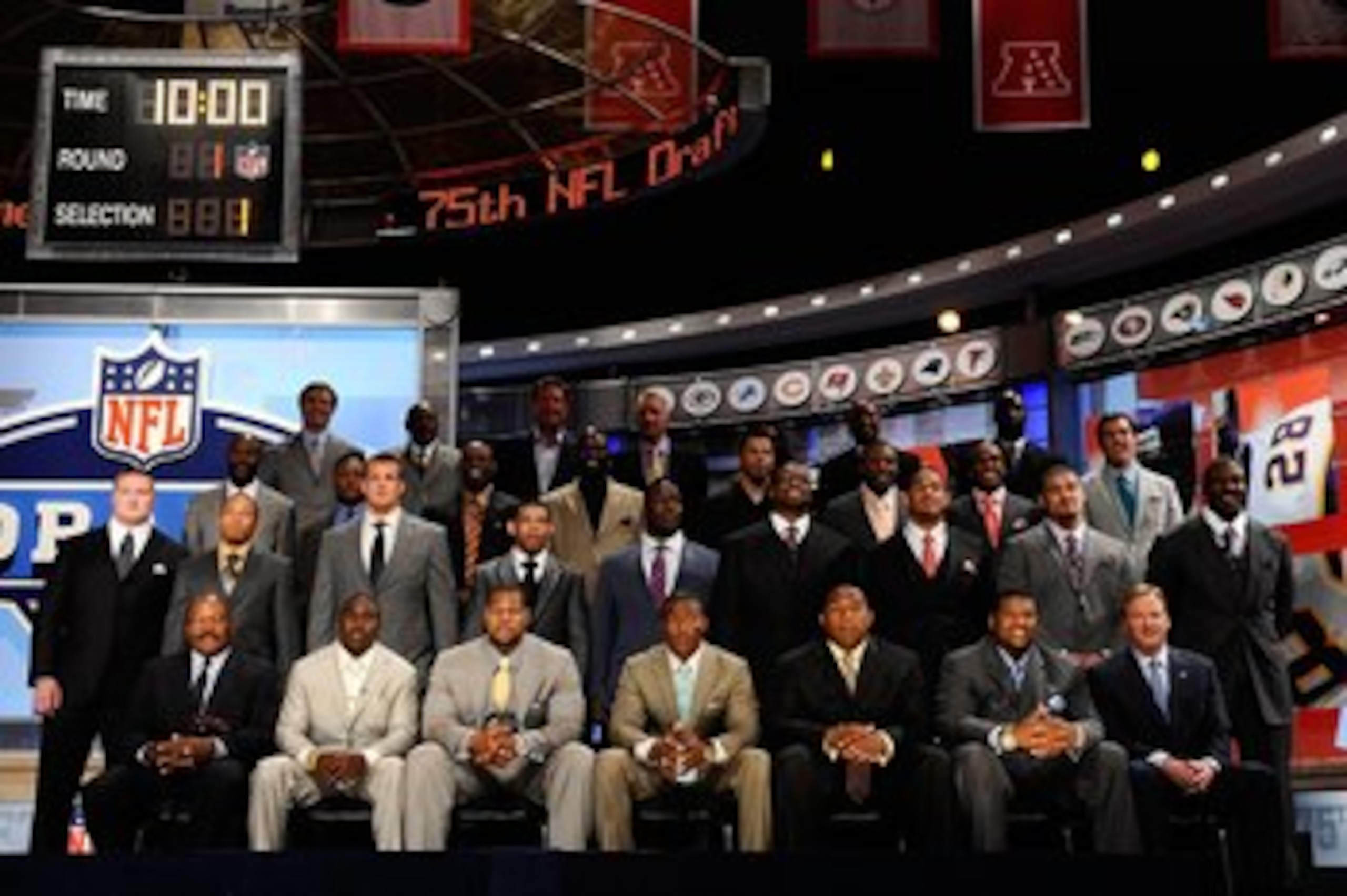 NEW YORK - APRIL 22:  2010 NFL Draft prospects pose for a group photo with NFL Commissioner Roger Goodell along with former and current NFL Players including Jim Brown, Jerry Rice, Dan Marino, Lawrence Taylor, Deion Sanders, Barry Sanders, Joe Montana, Fl