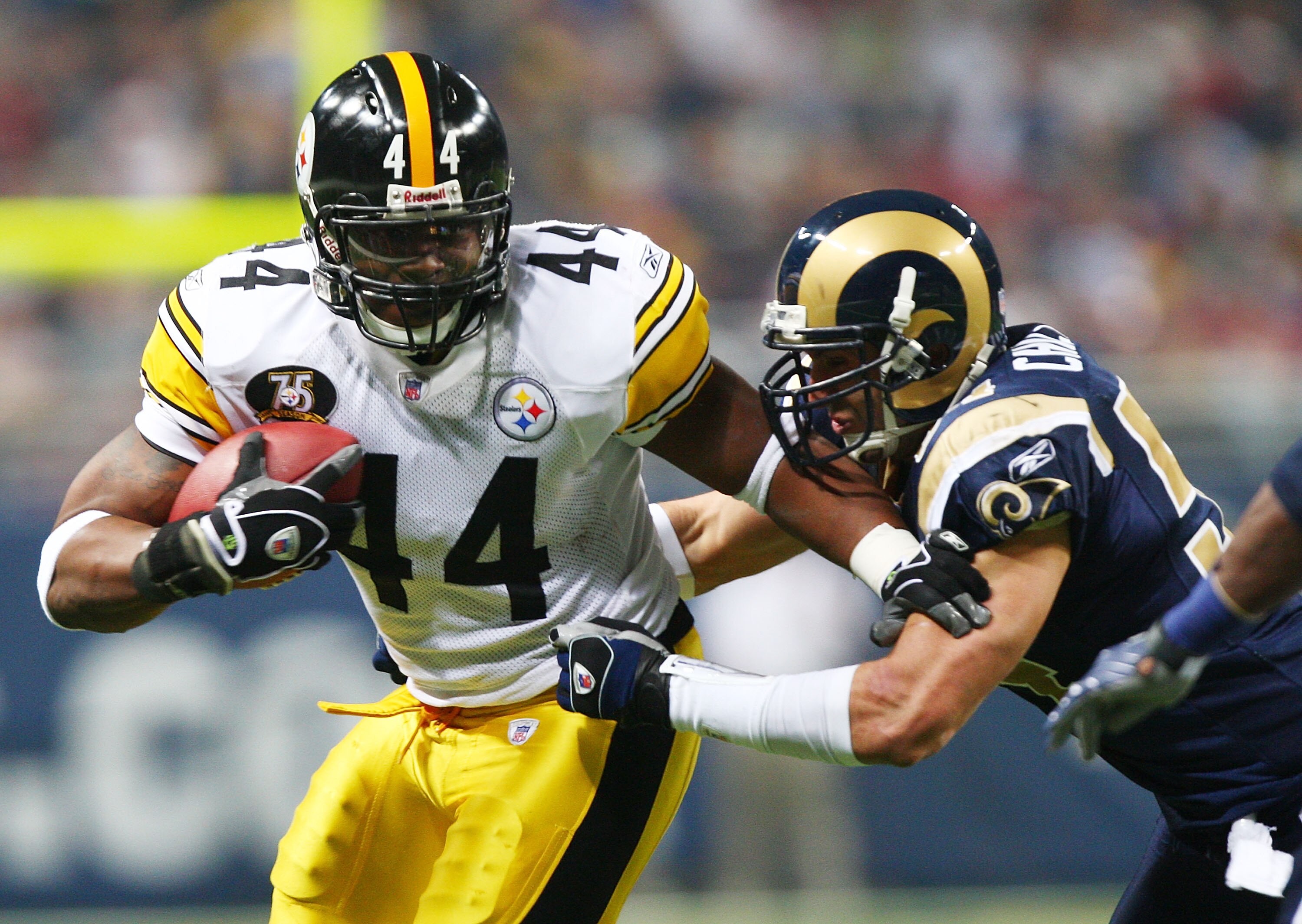 ST. LOUIS - DECEMBER 20:  Najeh Davenport #44 of the Pittsburgh Steelers is shoved out of bounds by randon Chillar #54 of the St. Louis Rams on December 20, 2007 at Edward Jones Dome in St. Louis, Missouri.  (Photo by Elsa/Getty Images)