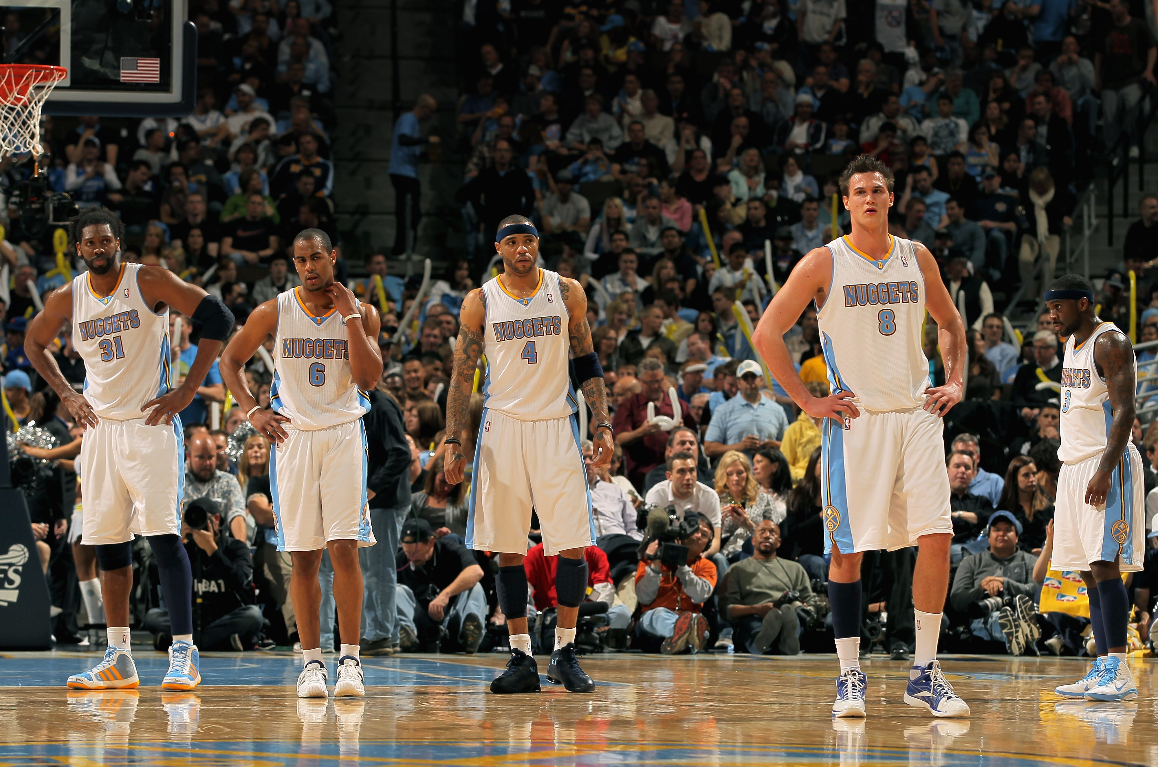 DENVER, CO - APRIL 23:  Nene Hilario #31, Arron Afflalo #6, Kenyon Martin #4, Danilo Gallinari #8 and Ty Lawson #3 of the Denver Nuggets look on as they await action against the Oklahoma City Thunder in Game Three of the Western Conference Quarterfinals i