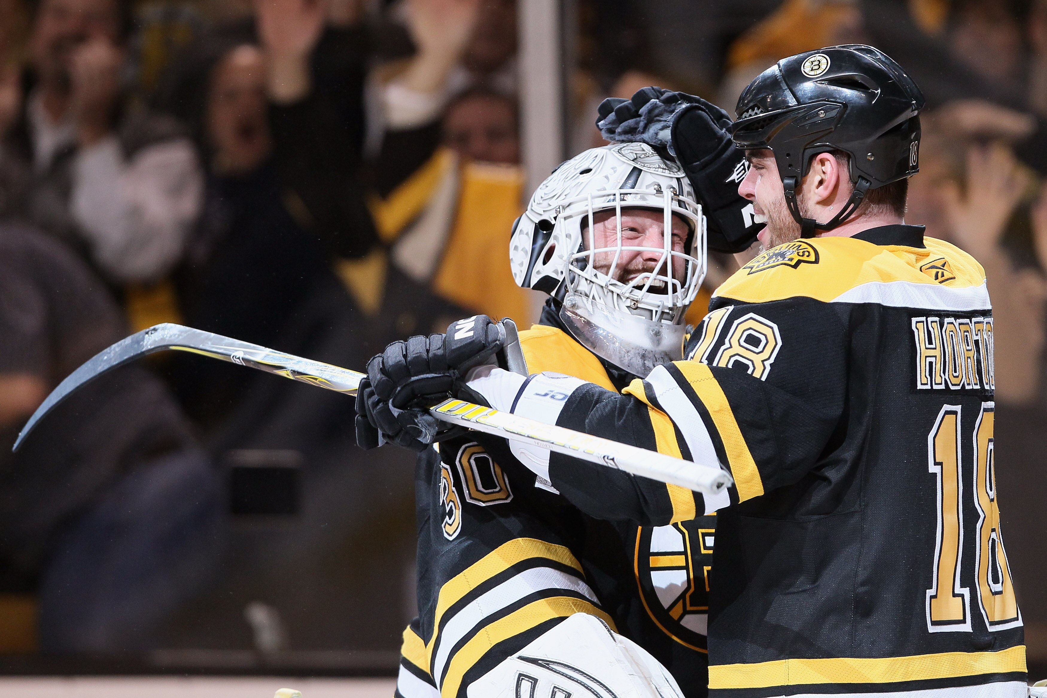 BOSTON, MA - APRIL 23:  Tim Thomas #30 and Nathan Horton #18 of the Boston Bruins celebrate the win in Game Five of the Eastern Conference Quarterfinals during the 2011 NHL Stanley Cup Playoffs at TD Garden on April 23, 2011 in Boston, Massachusetts. The 