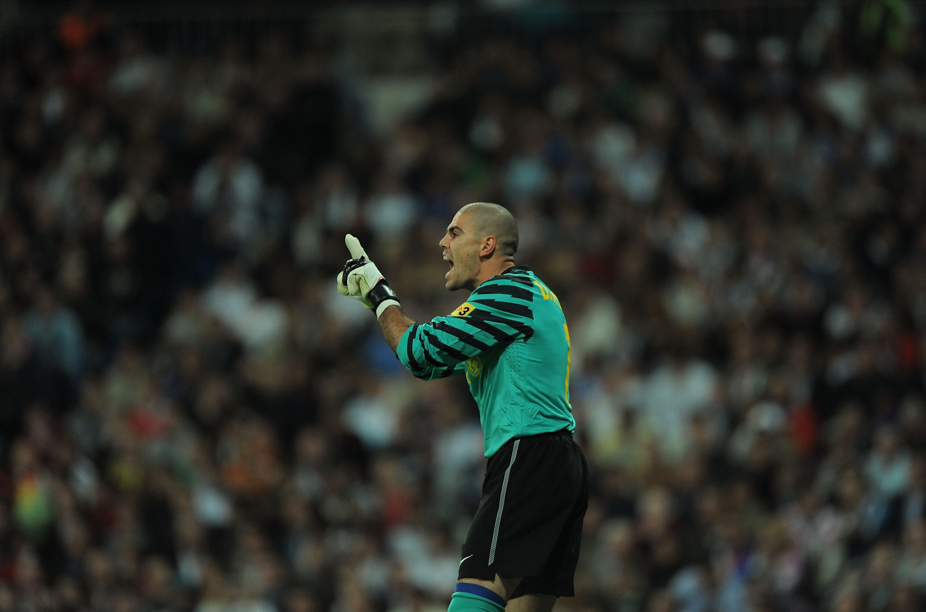 MADRID, SPAIN - APRIL 16: Victor Valdes of Barcelona reacts during the La Liga match between Real Madrid and Barcelona at Estadio Santiago Bernabeu on April 16, 2011 in Madrid, Spain.  (Photo by Denis Doyle/Getty Images)