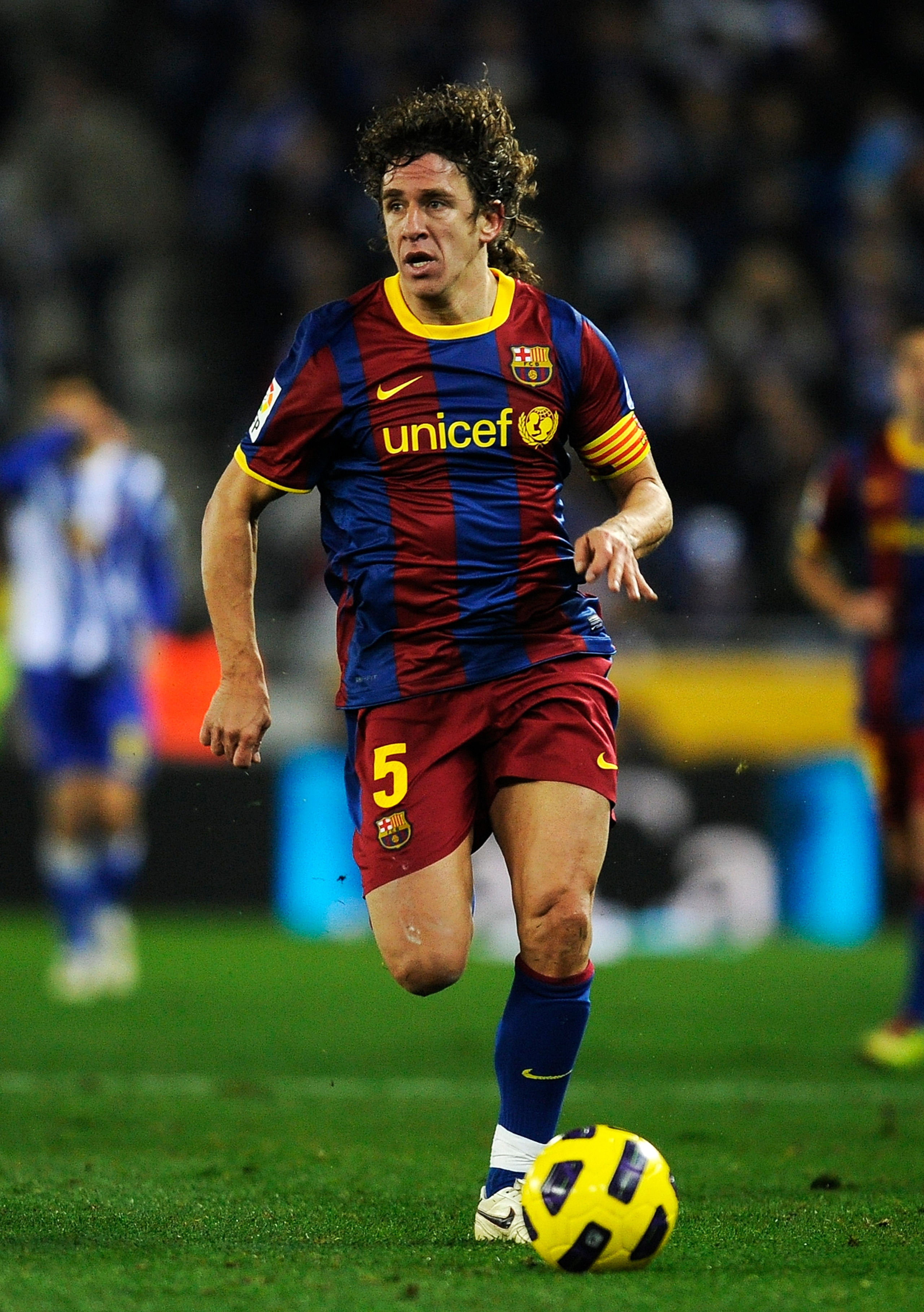 BARCELONA, SPAIN - DECEMBER 18: Carles Puyol of Barcelona runs with the ball during the La Liga match between Espanyol and Barcelona at Cornella - El Prat stadium on December 18, 2010 in Barcelona, Spain. Barcelona won the match 1-5. (Photo by David Ram BARCELONA, SPAIN - DECEMBER 18: Carles Puyol of Barcelona runs with the ball during the La Liga match between Espanyol and Barcelona at Cornella - El Prat stadium on December 18, 2010 in Barcelona, Spain. Barcelona won the match 1-5. (Photo by David Ram
